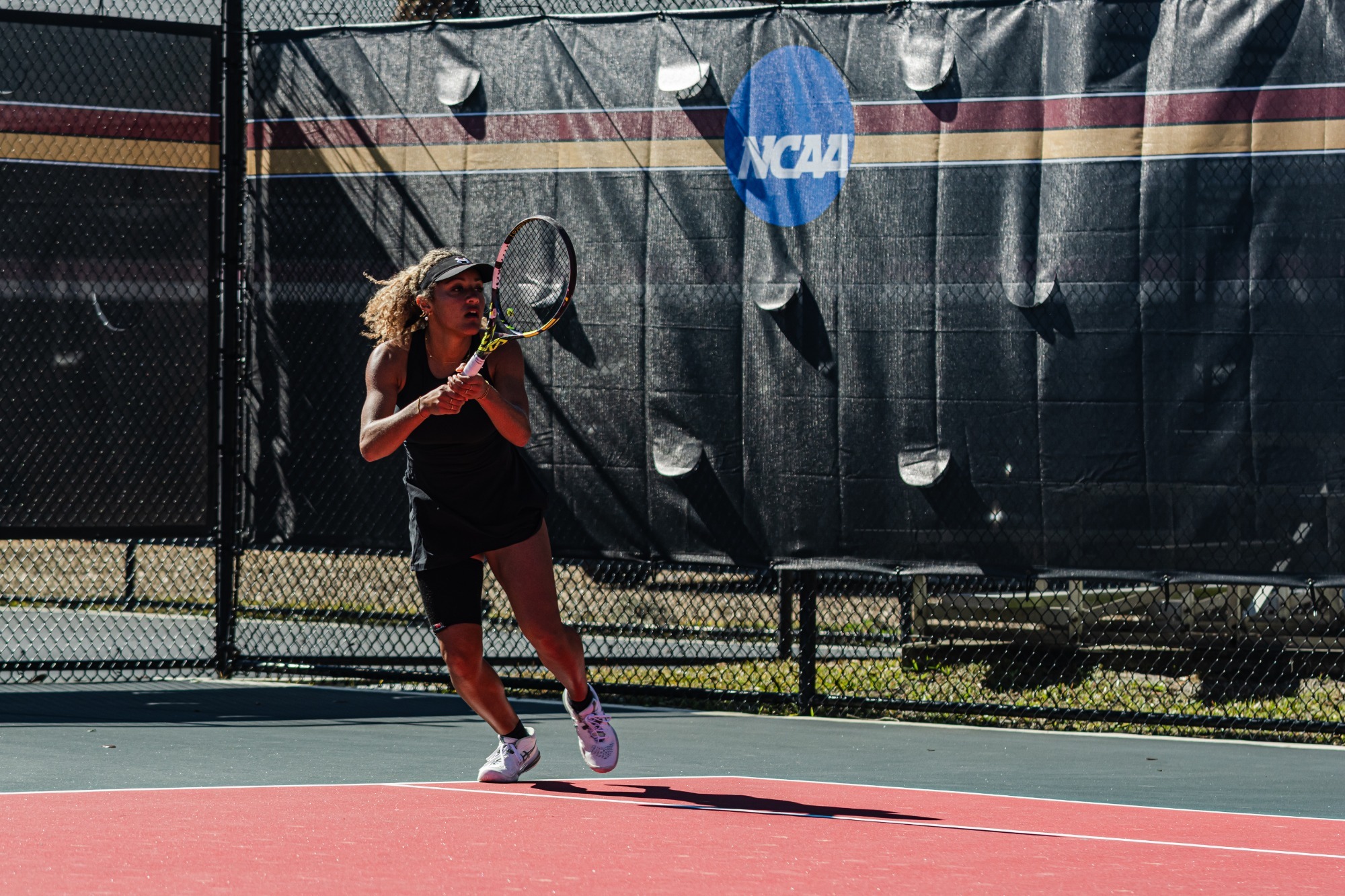 Elena Ondobo finishing her swing