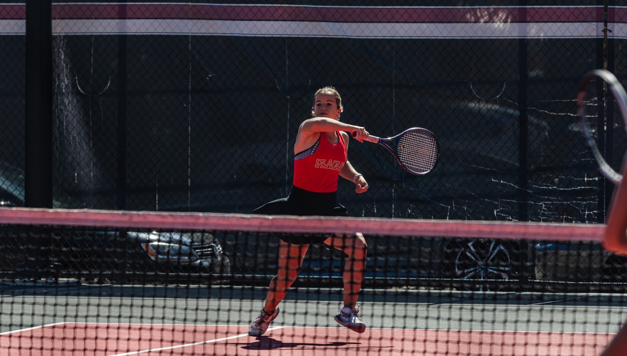 Ornella Lomenzo following through a swing