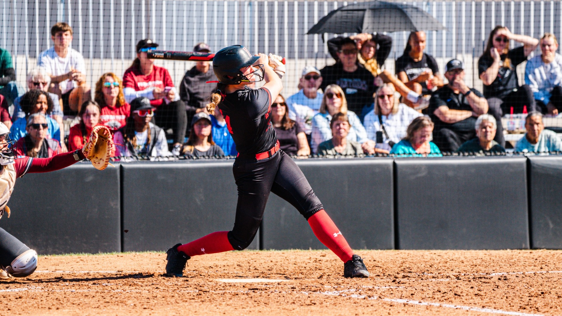 Stephanie Daly finishing her swing
