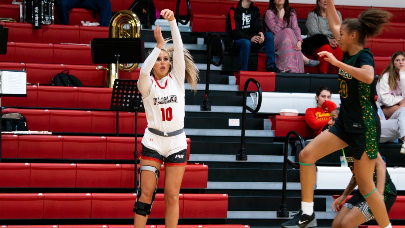 Jessica Dowdy shoots a three-pointer