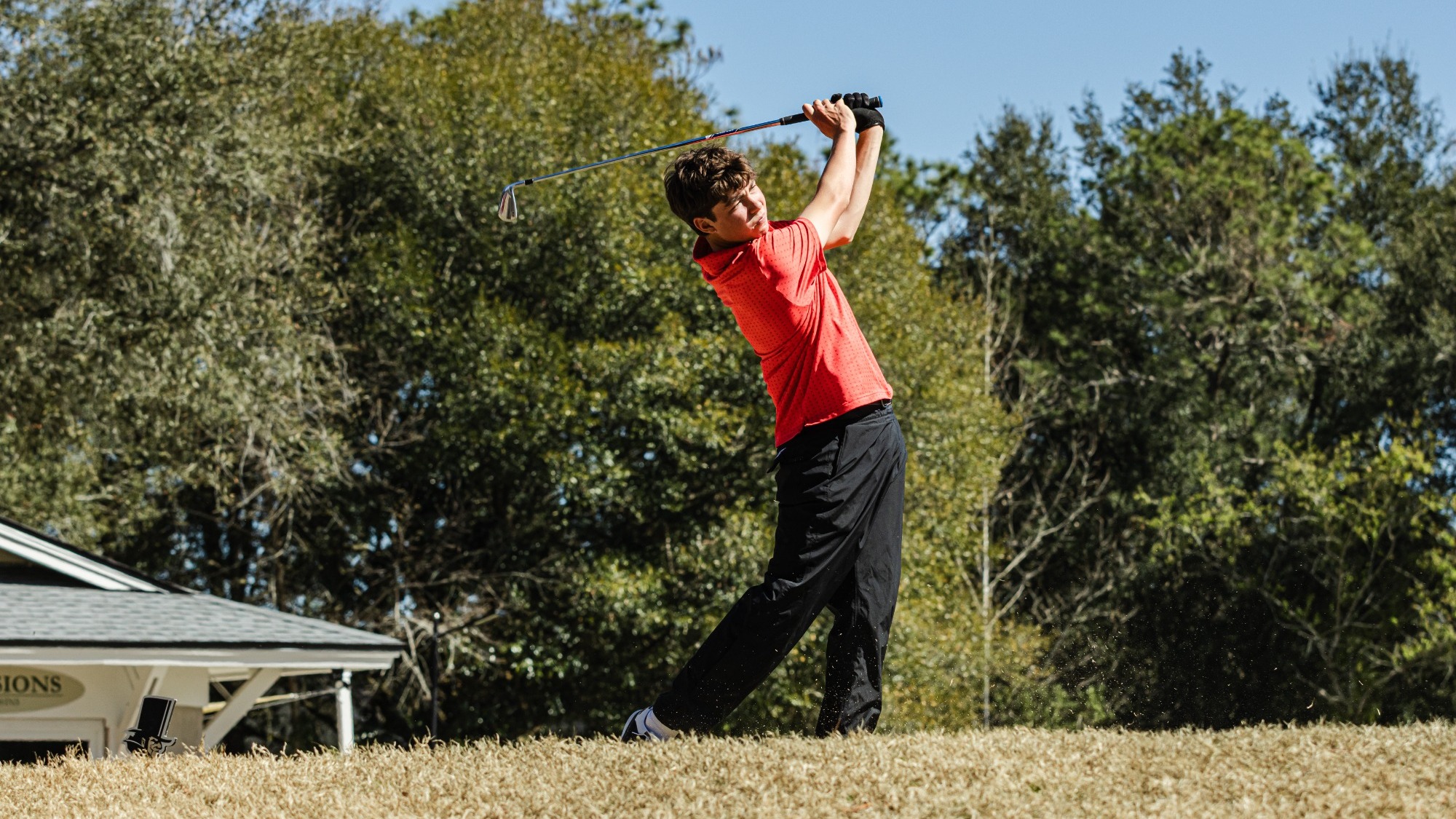 PJ Herron hits a drive