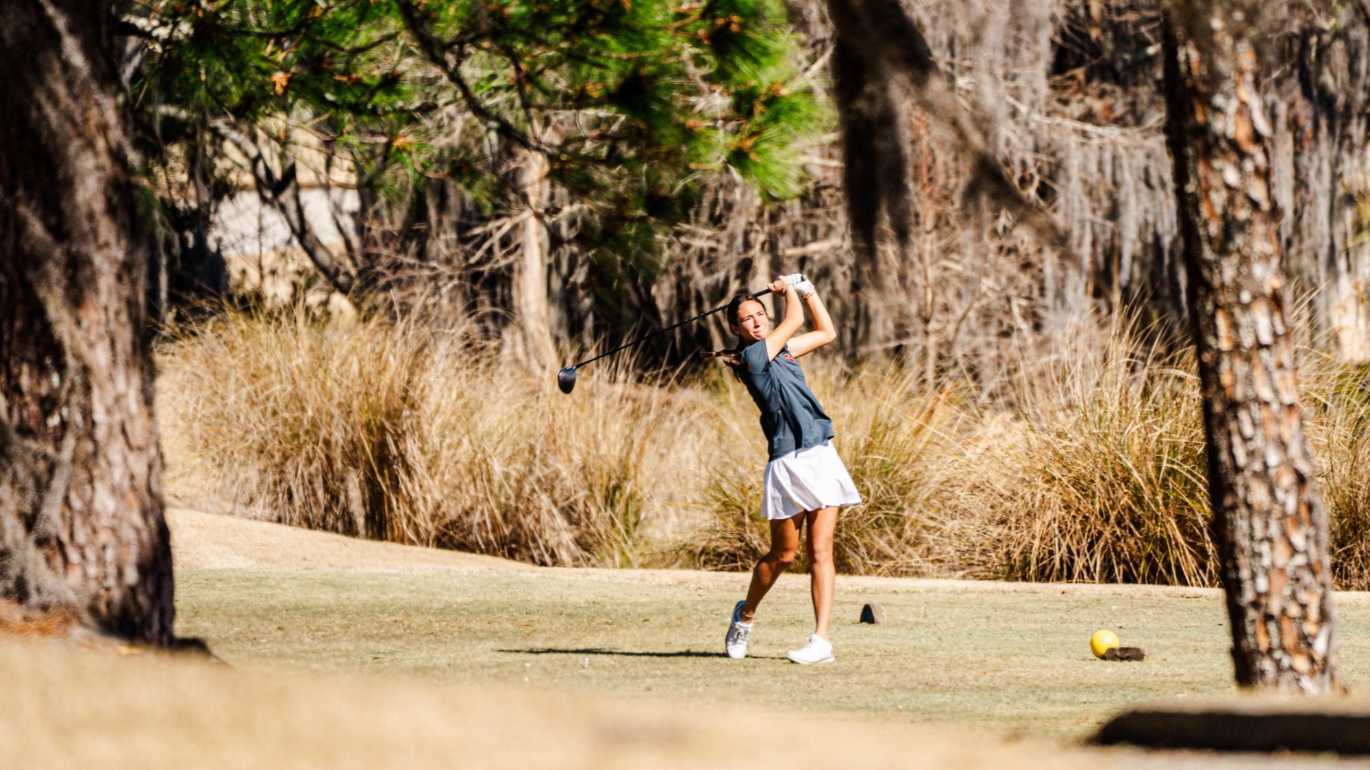 Sofia Terzoli hits a tee shot
