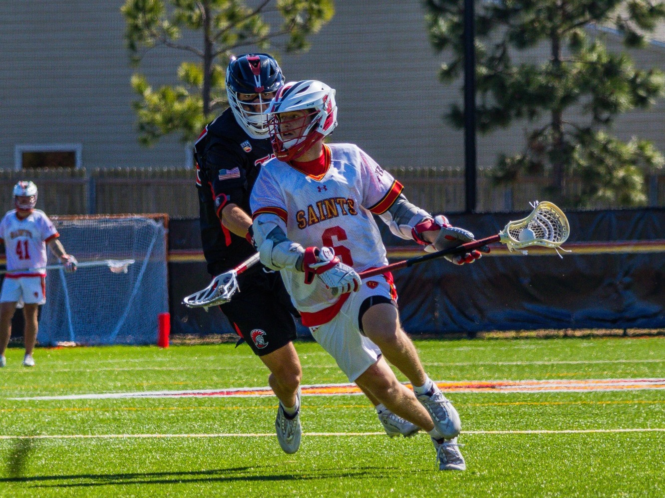 Trace McDonald driving down the lane to shoot