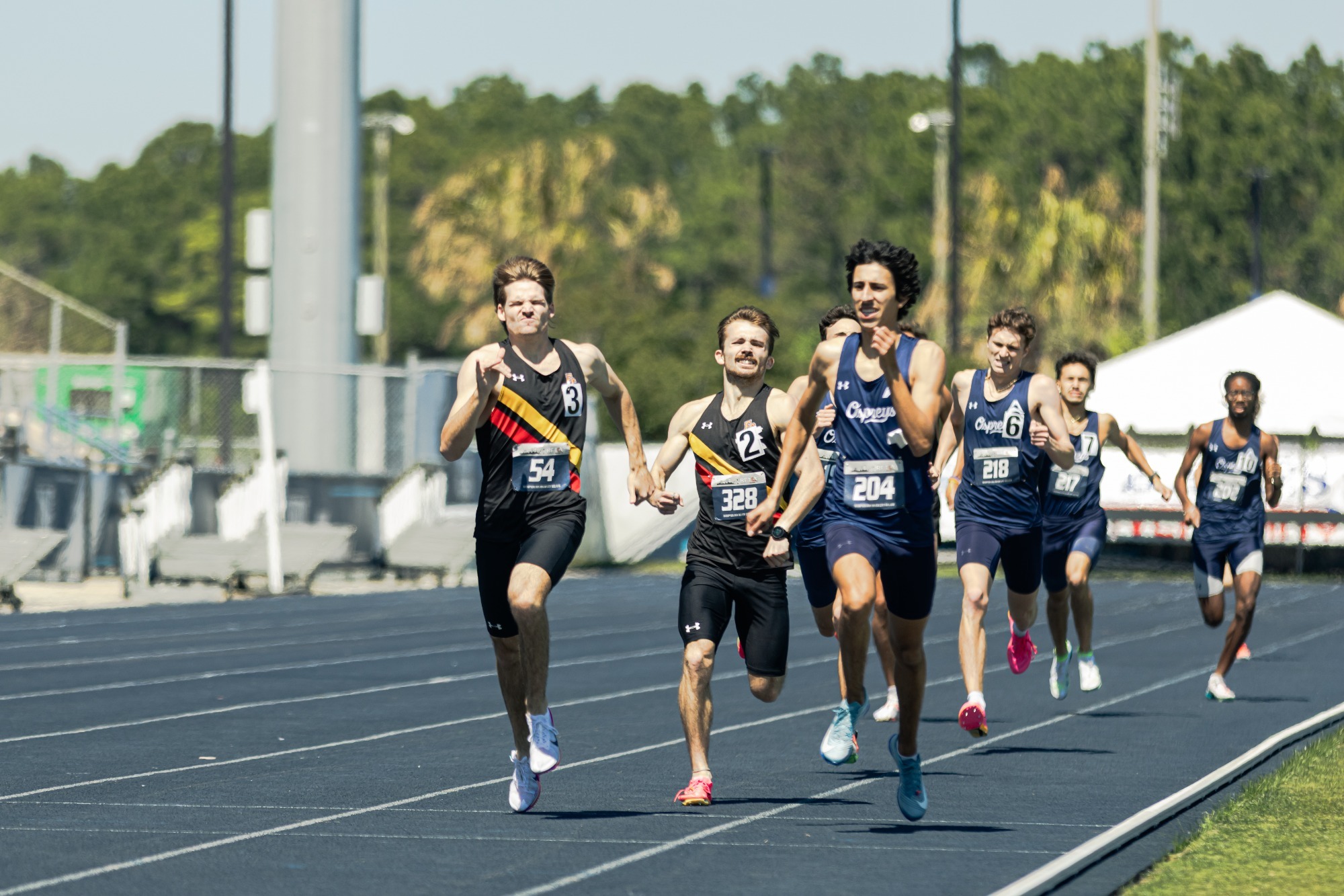 Luke Larkin and John Carbone running towards to finish line
