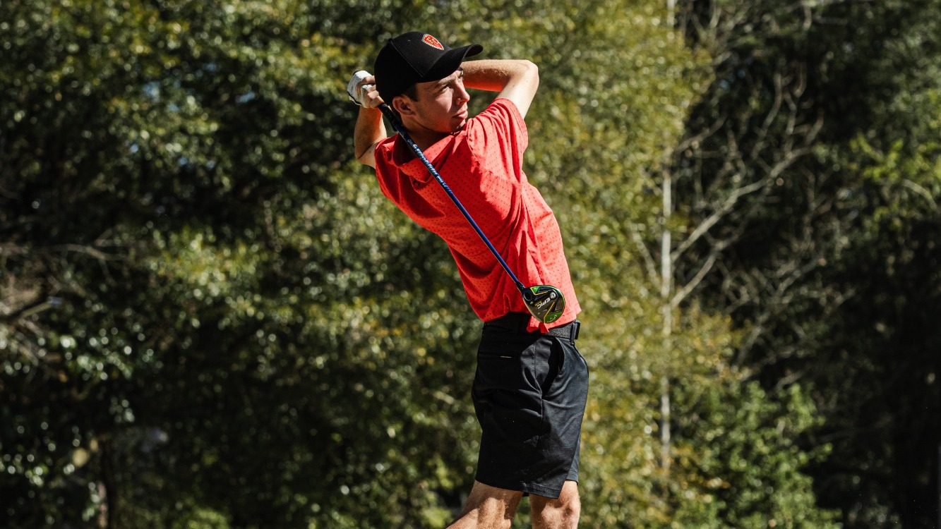 Matthew French hits a tee shot