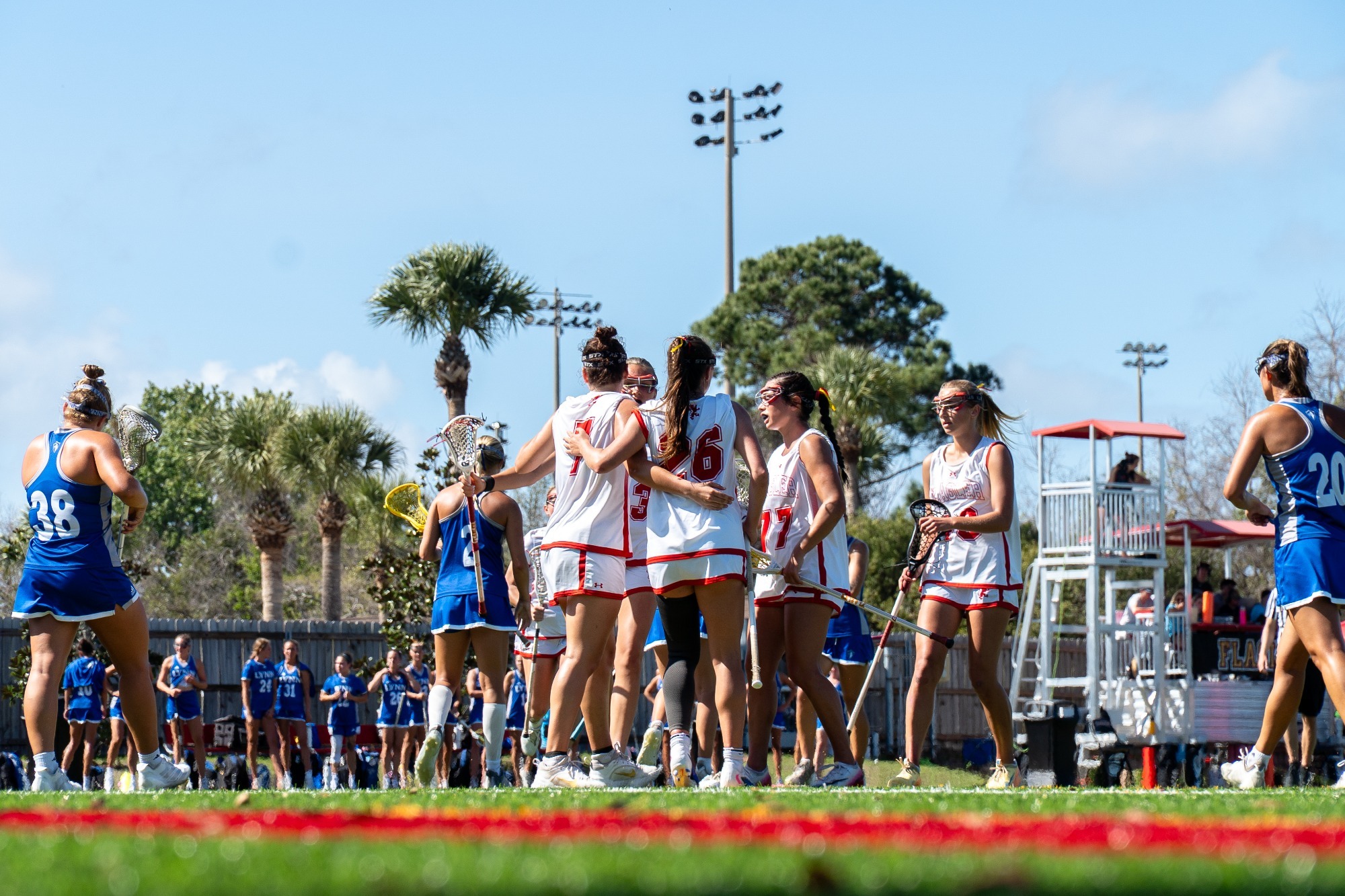 Women's team huddle after a goal