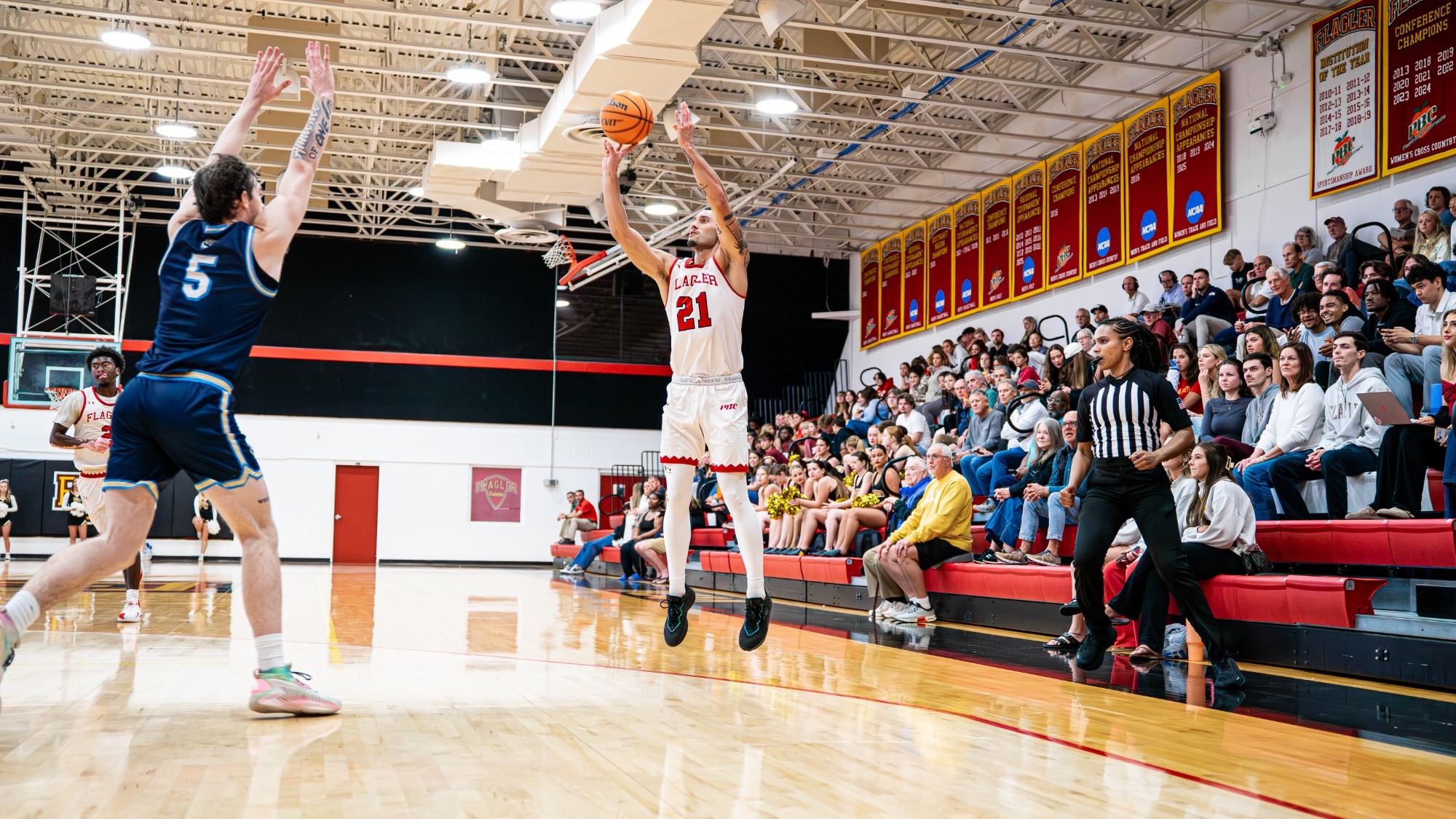 Hoku Fisher shoots a three-pointer
