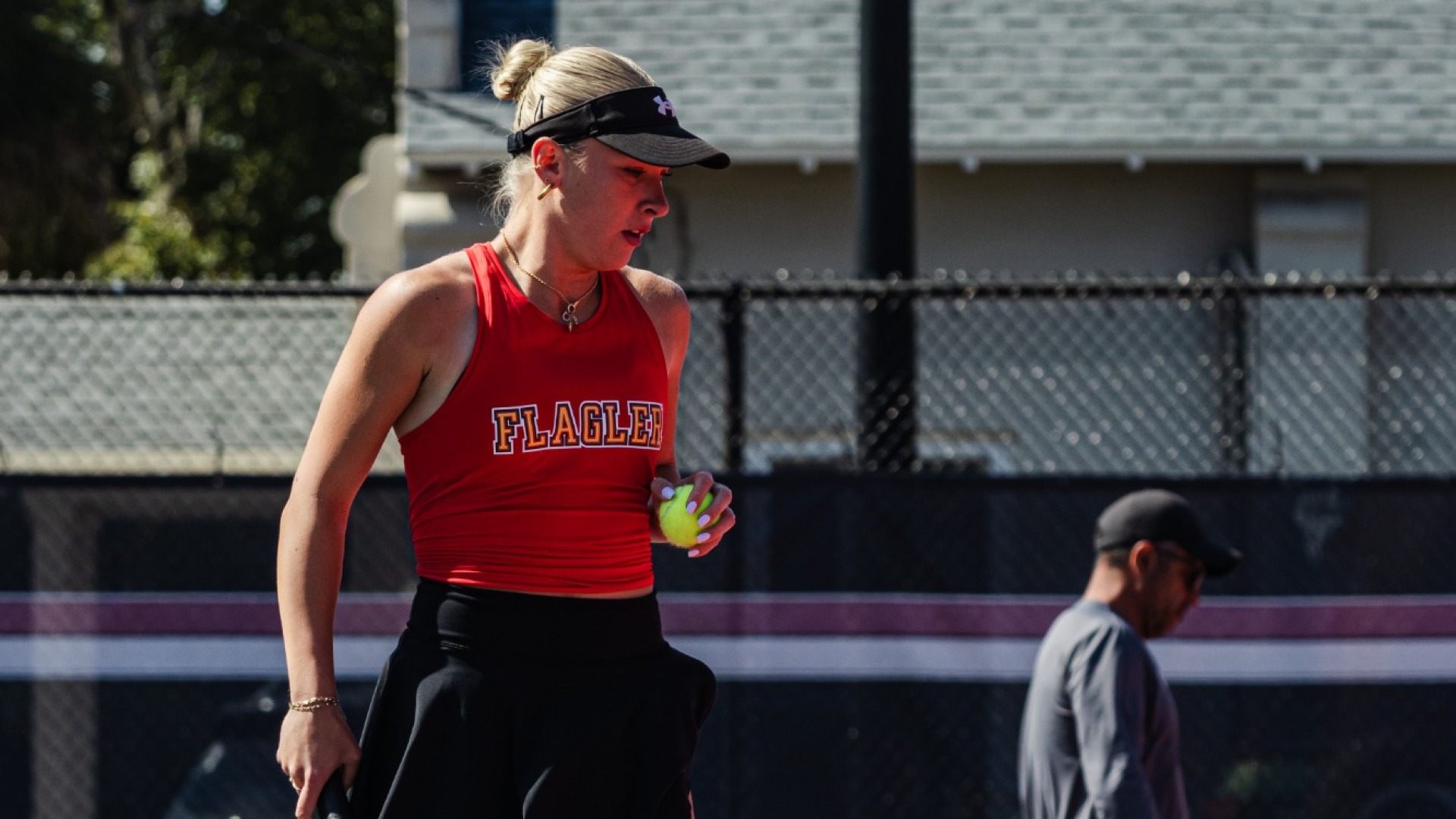 Eryka Kruk inhaling before a serve