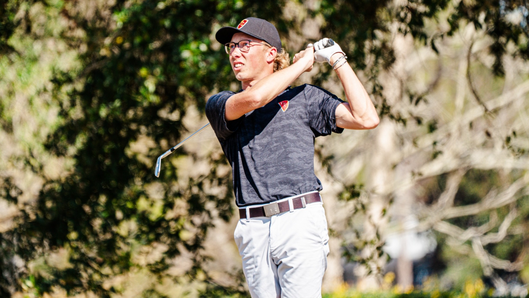 Masen McKain finishes his follow through on an iron shot