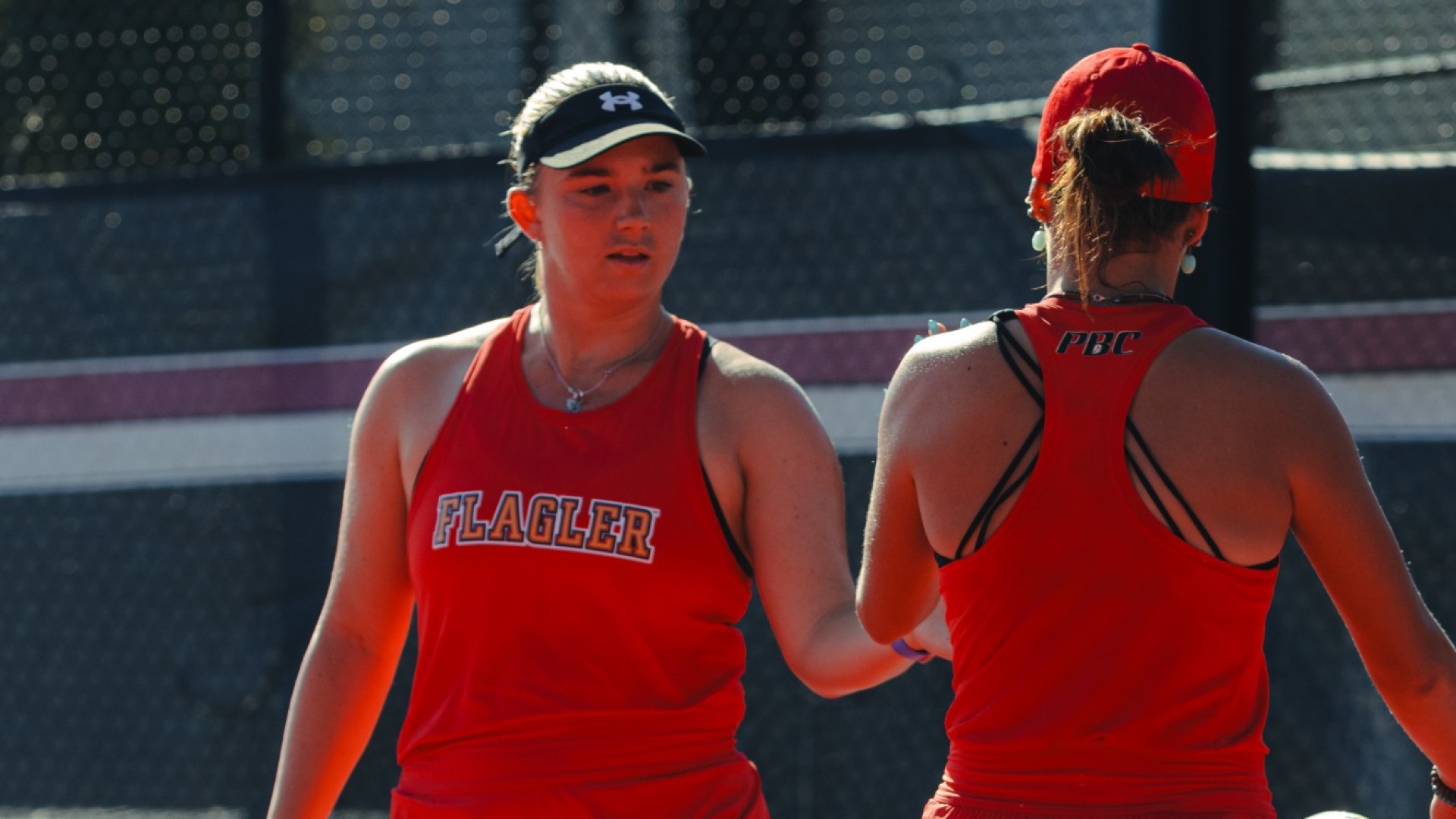 Leah Waechter and Sofia Balsera high fiving