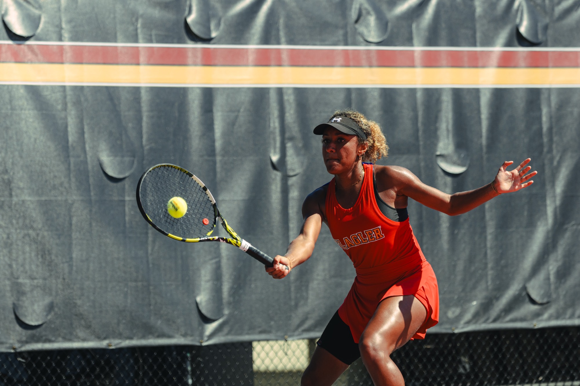 Elena Ondobo meeting a shot
