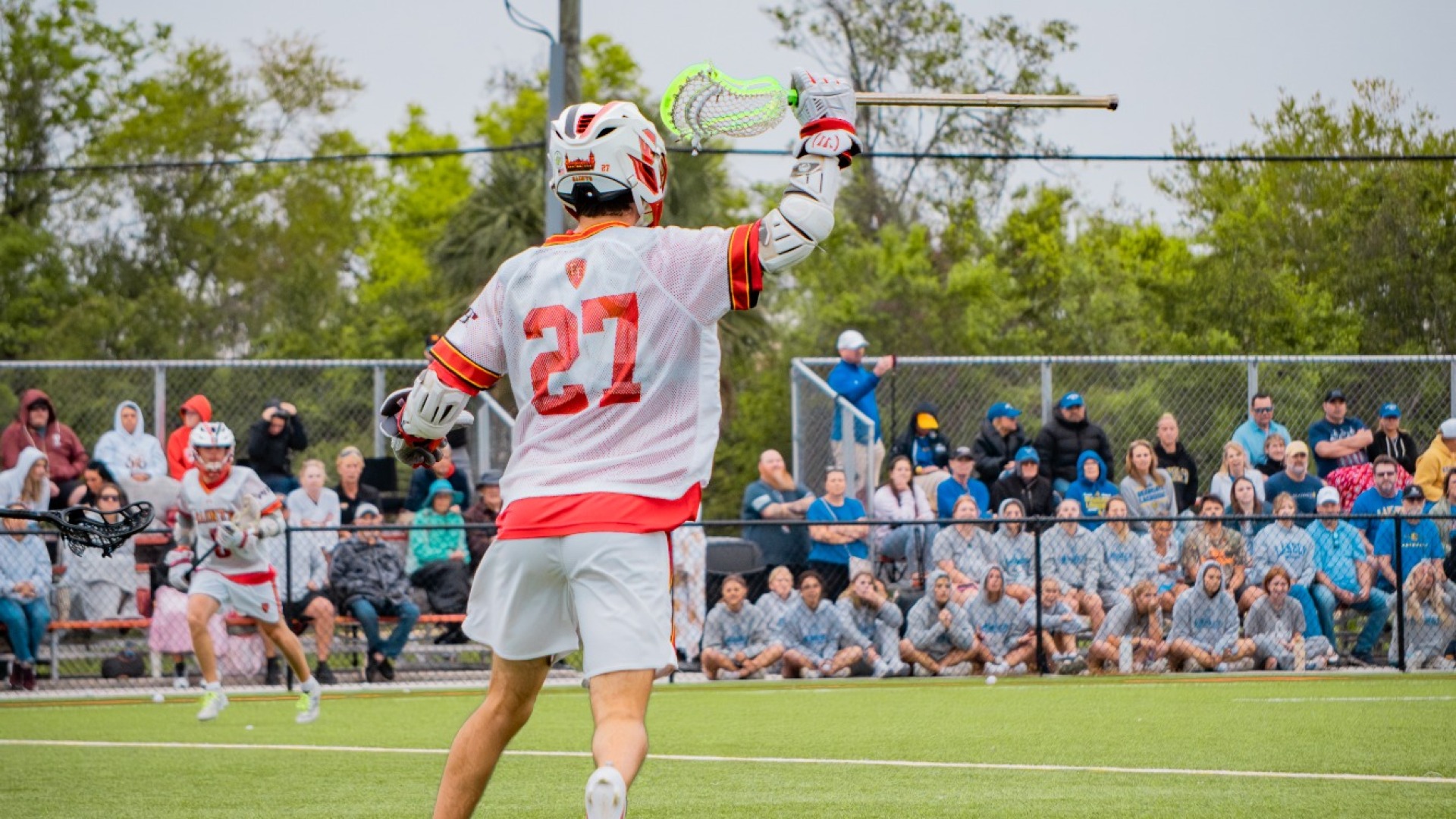 Will Linko with his stick in the air