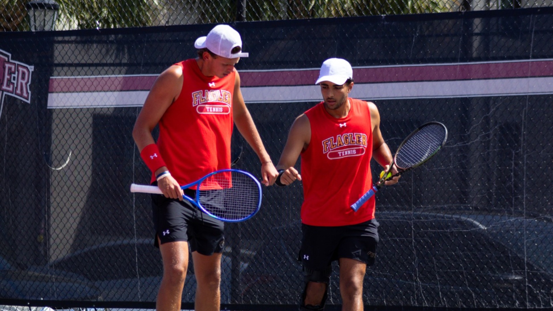 Simon Malis and Aniss Rafiq fist bumping