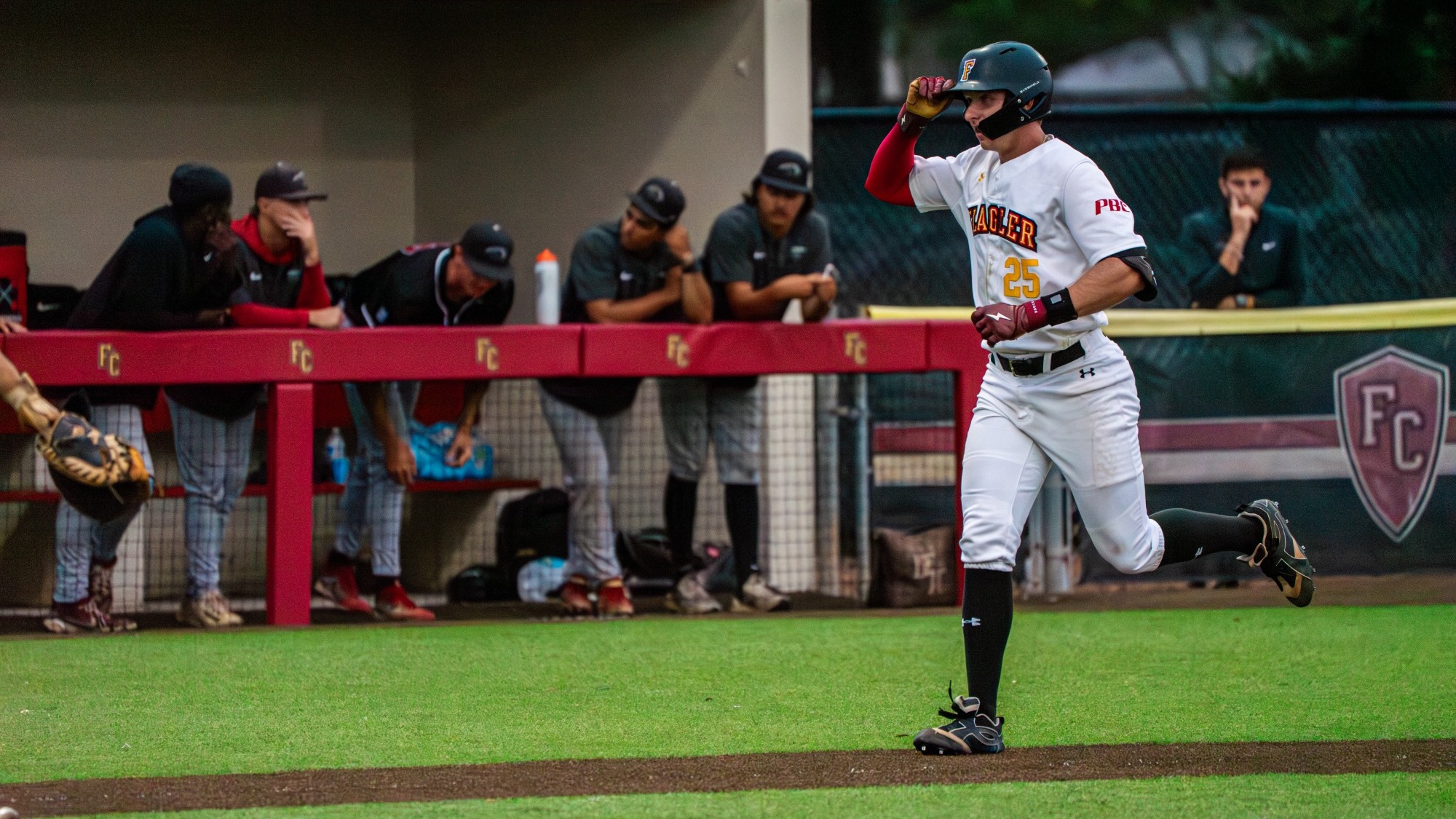 George Gilson trots down the third base line after a home run