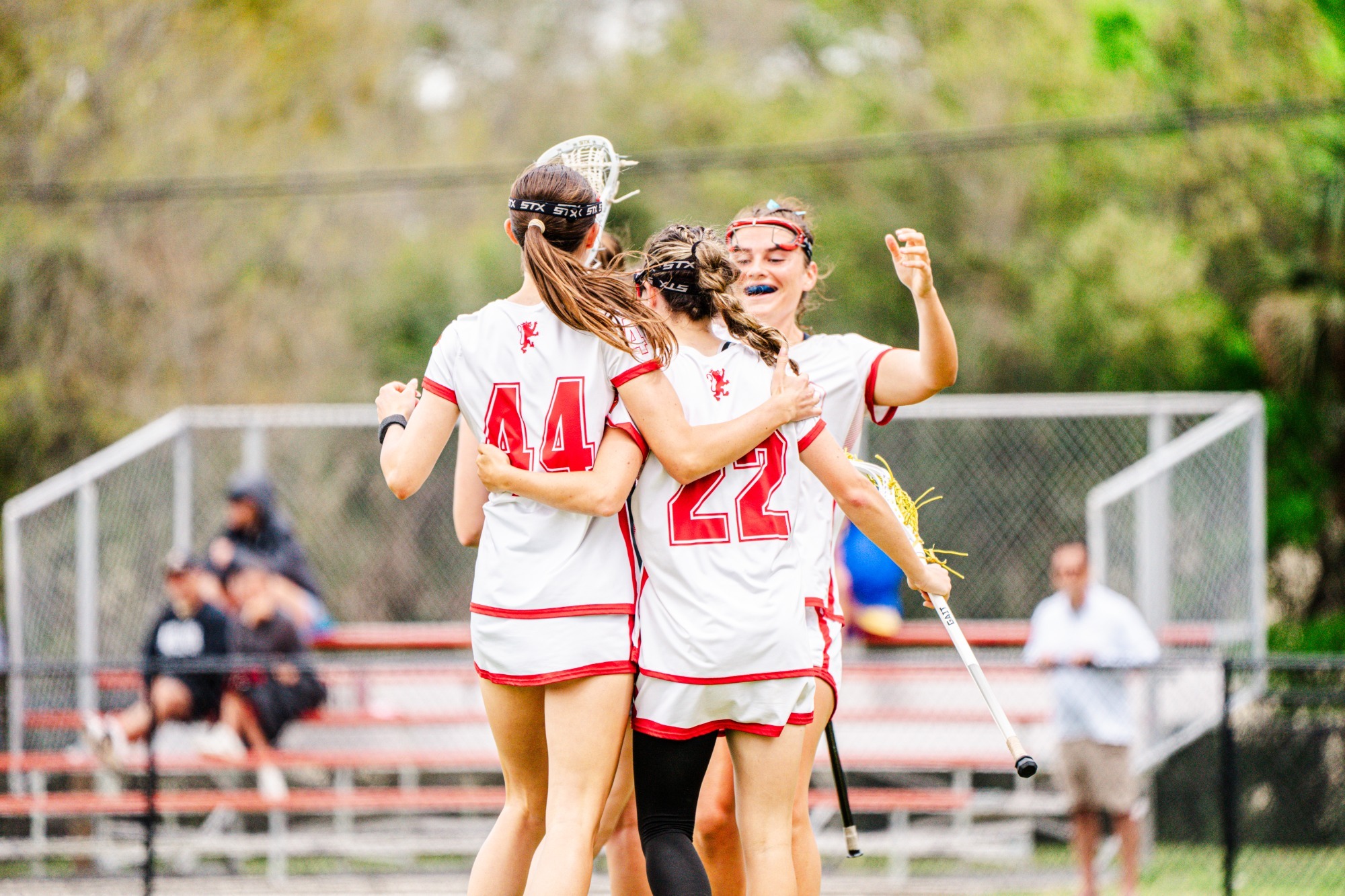 Martha Halford and Kylie Budke side hugging