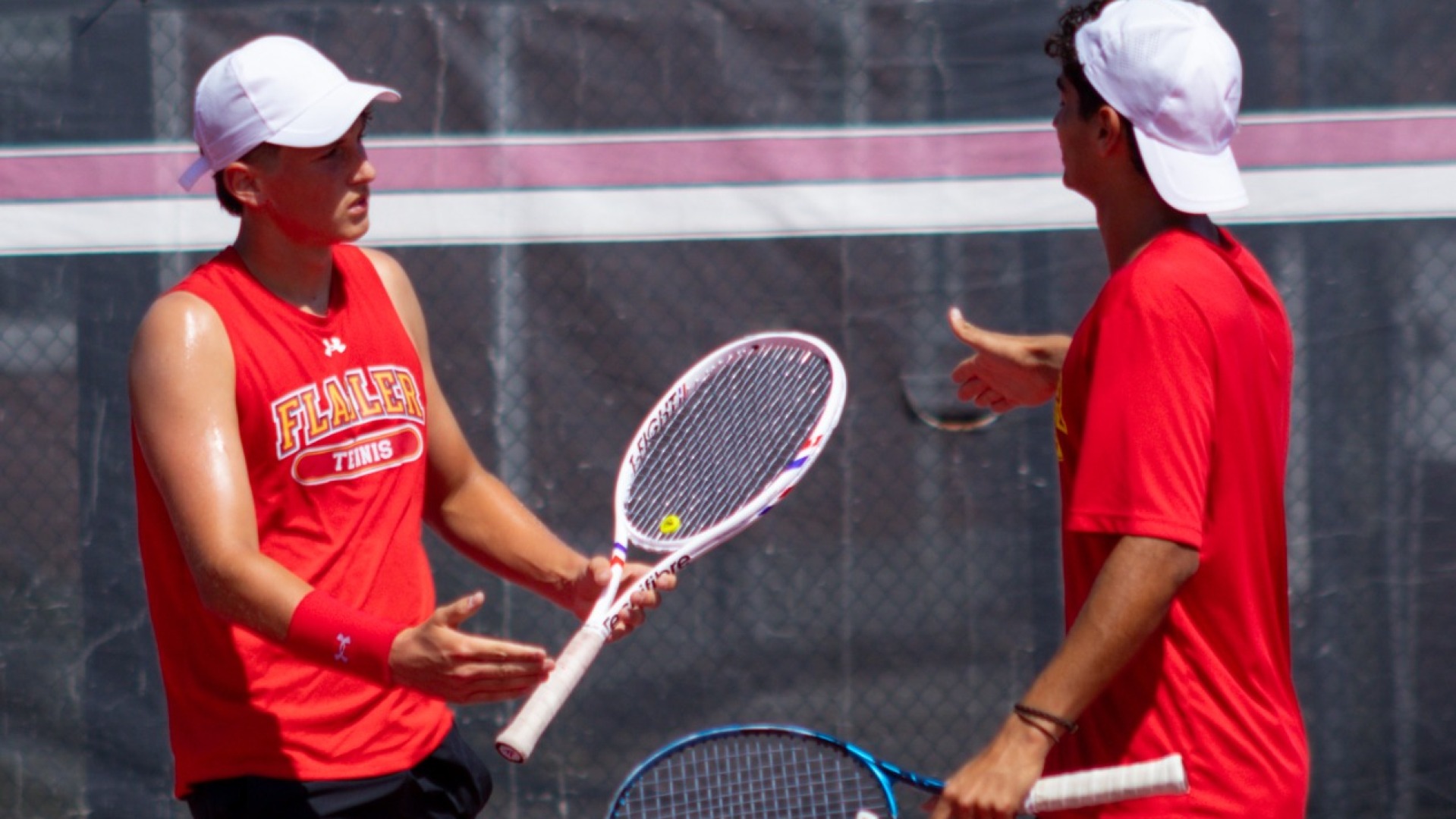 Aly El Rafie and Noah Paterson going in for a high five