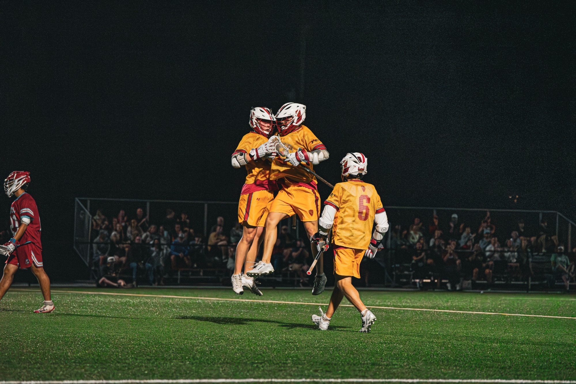 Team celebrating and jumping in the air