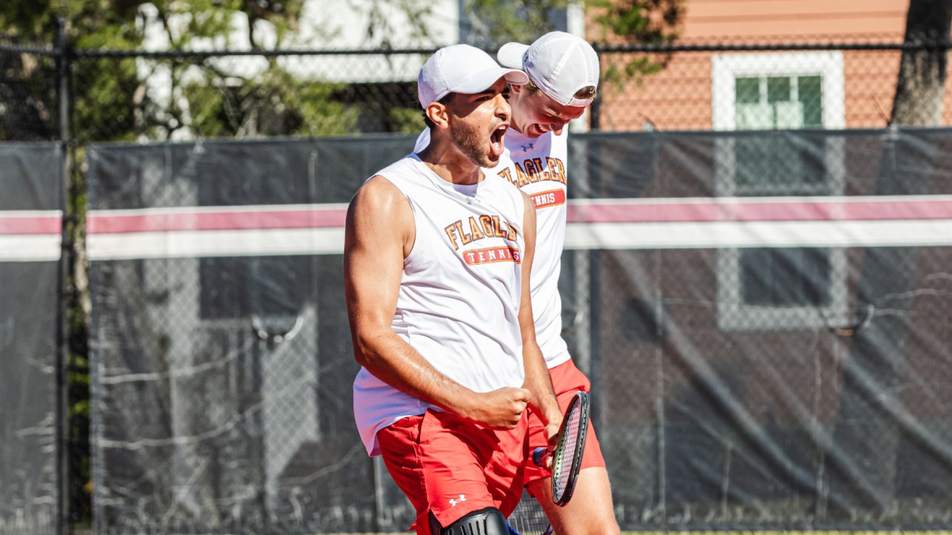 Aniss Rafiq yelling and Simon Malis smiling