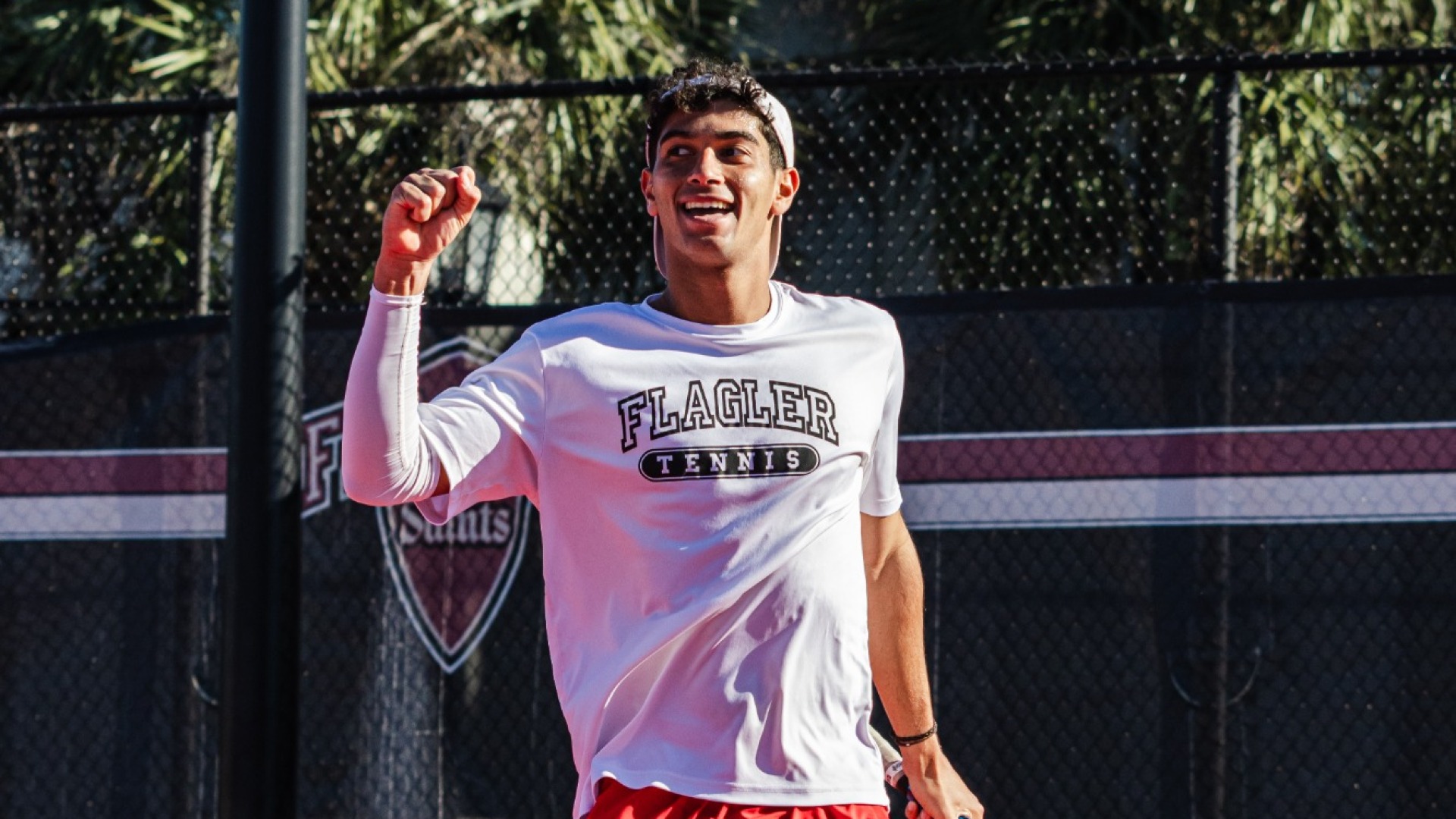 Aly El Rafie with his fist in the air
