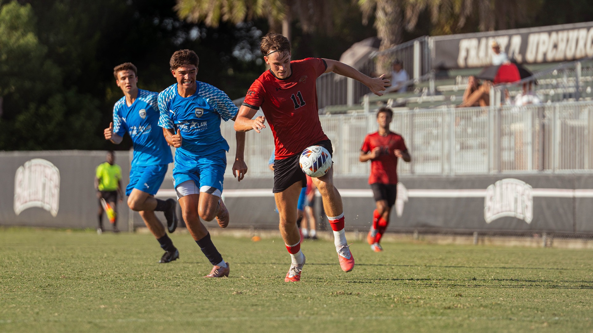 Finn Weigelt dribbling vs. JFC during exhibition match
