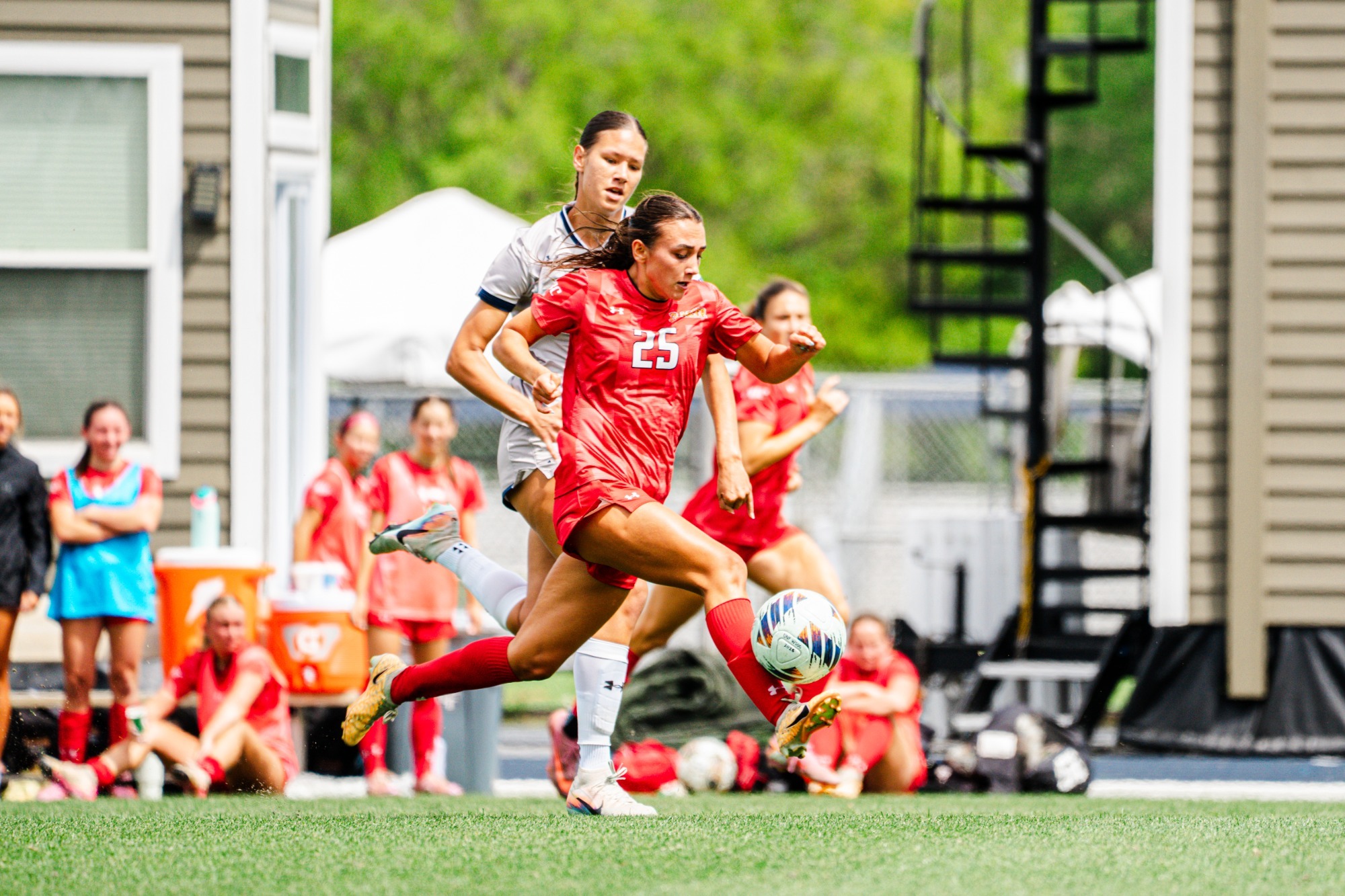 Ella Gembicki driving the ball downfield