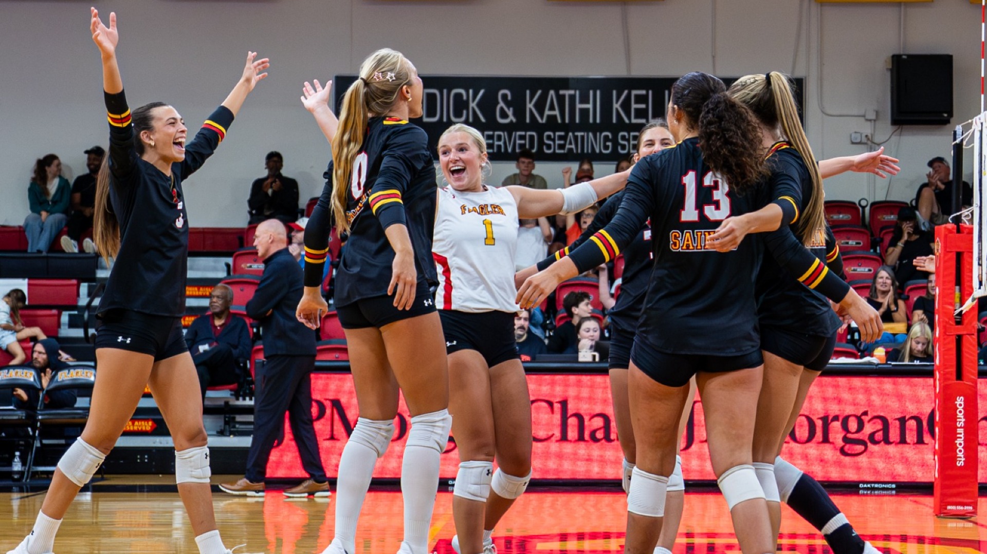 Saints celebrating victory over Middle Georgia