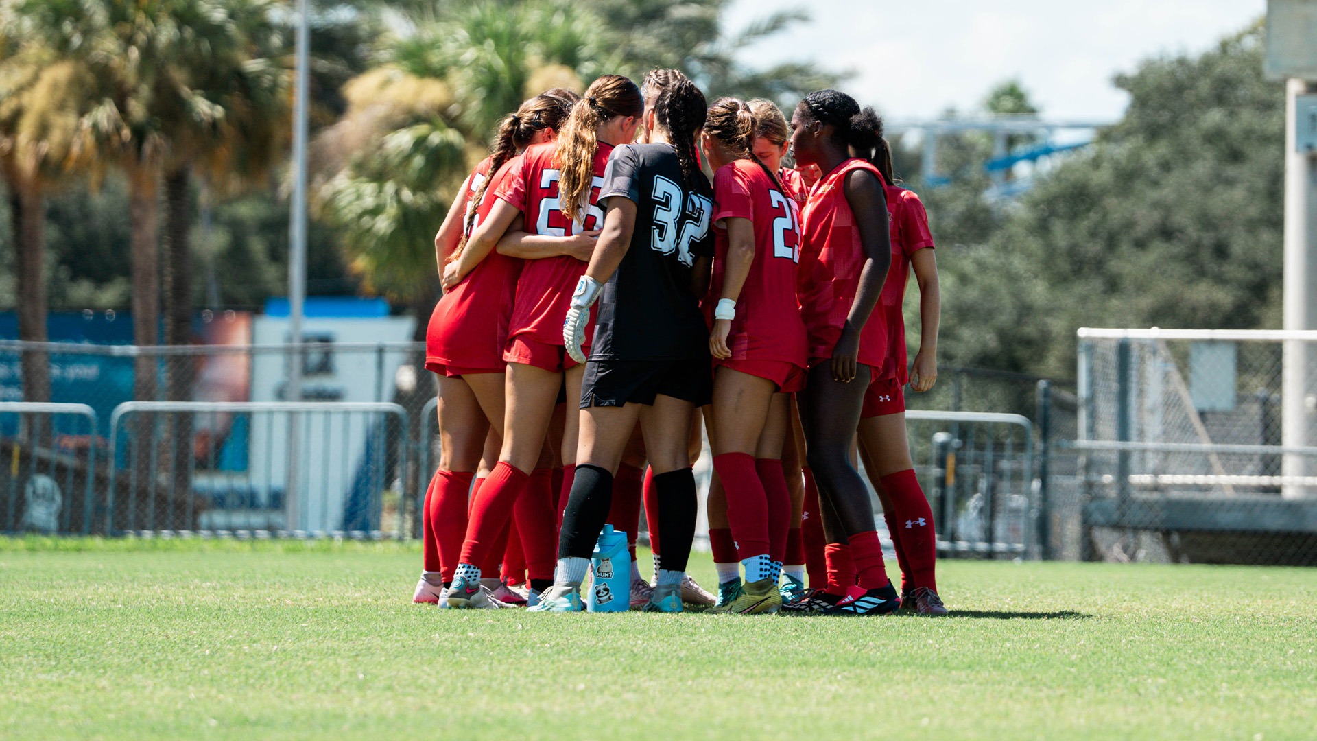 Flagler women's soccer team huddle at Embry-Riddle