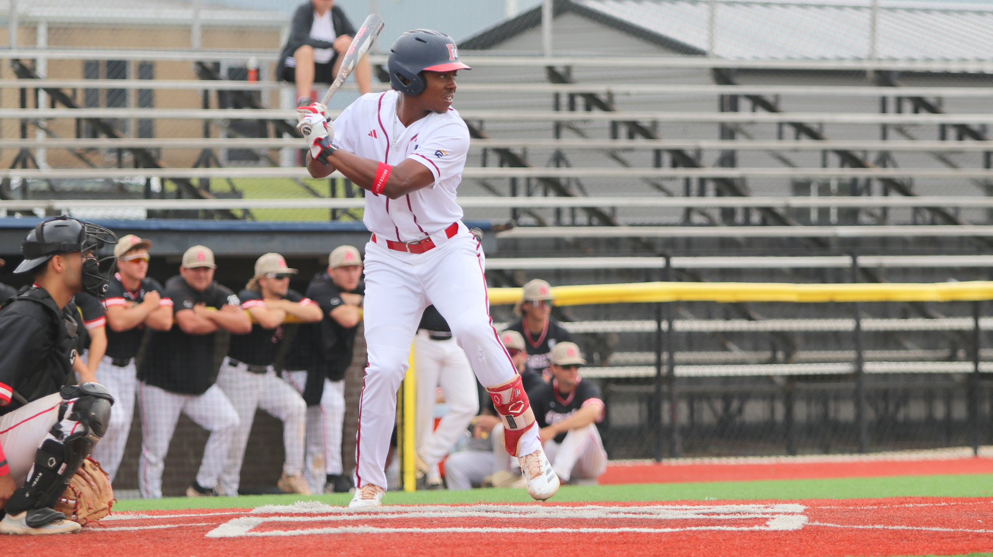 BB25 Charlie Bussey III at bat in white vs BAC