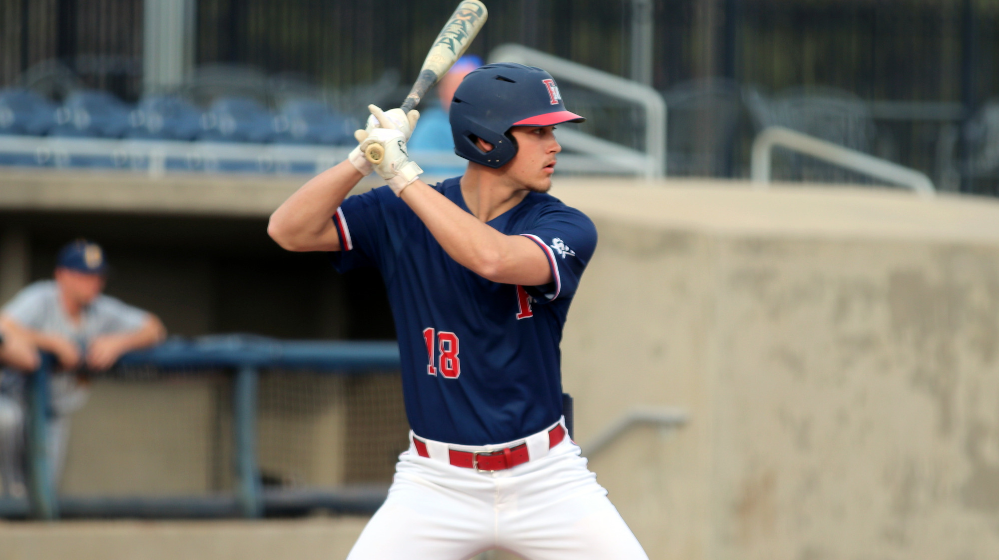 BB26 Ethan McAnally at bat in blue