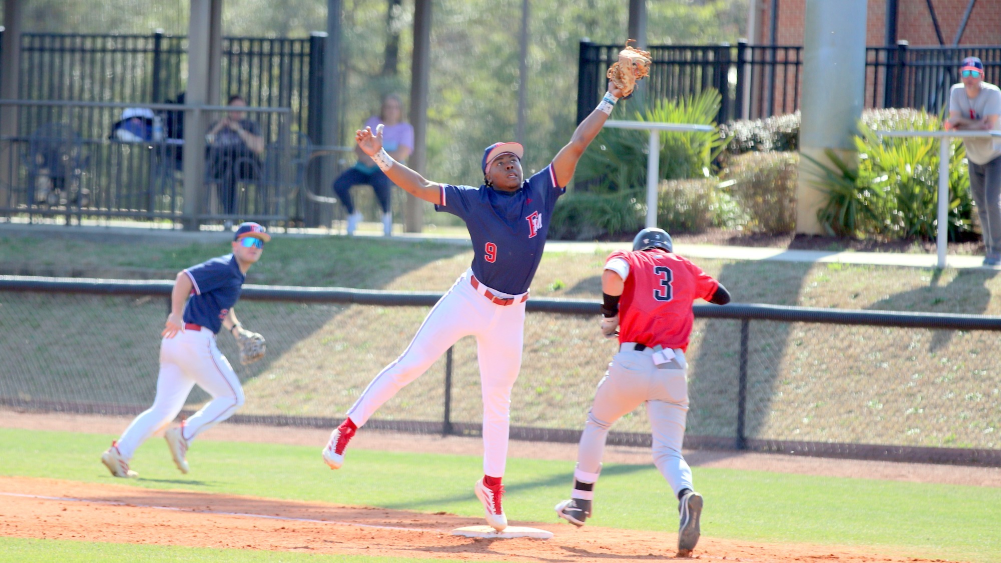 BB26 Charlie Bussey III makes play at first vs NGU