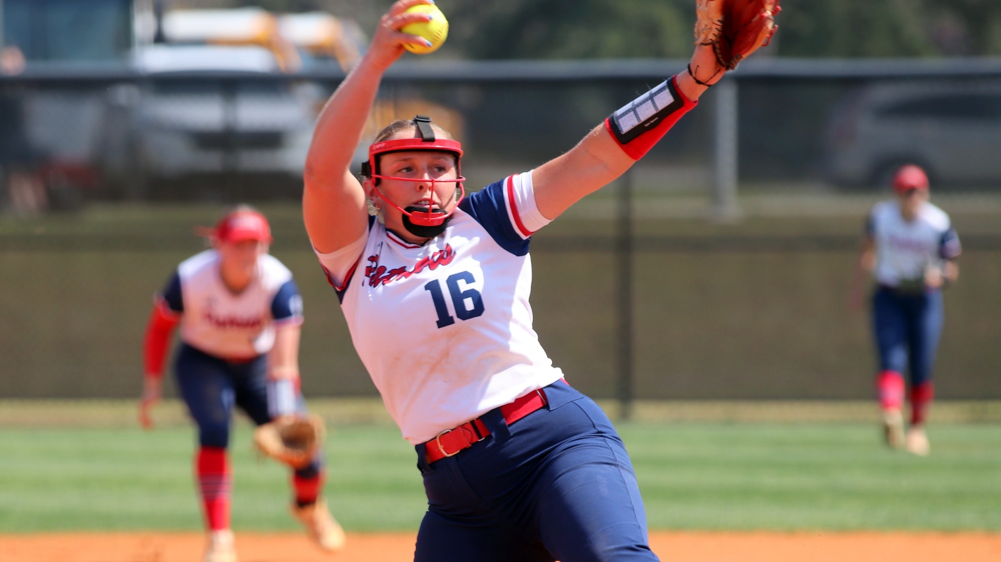 SB26 Jenna Walling pitching in white and blue combo