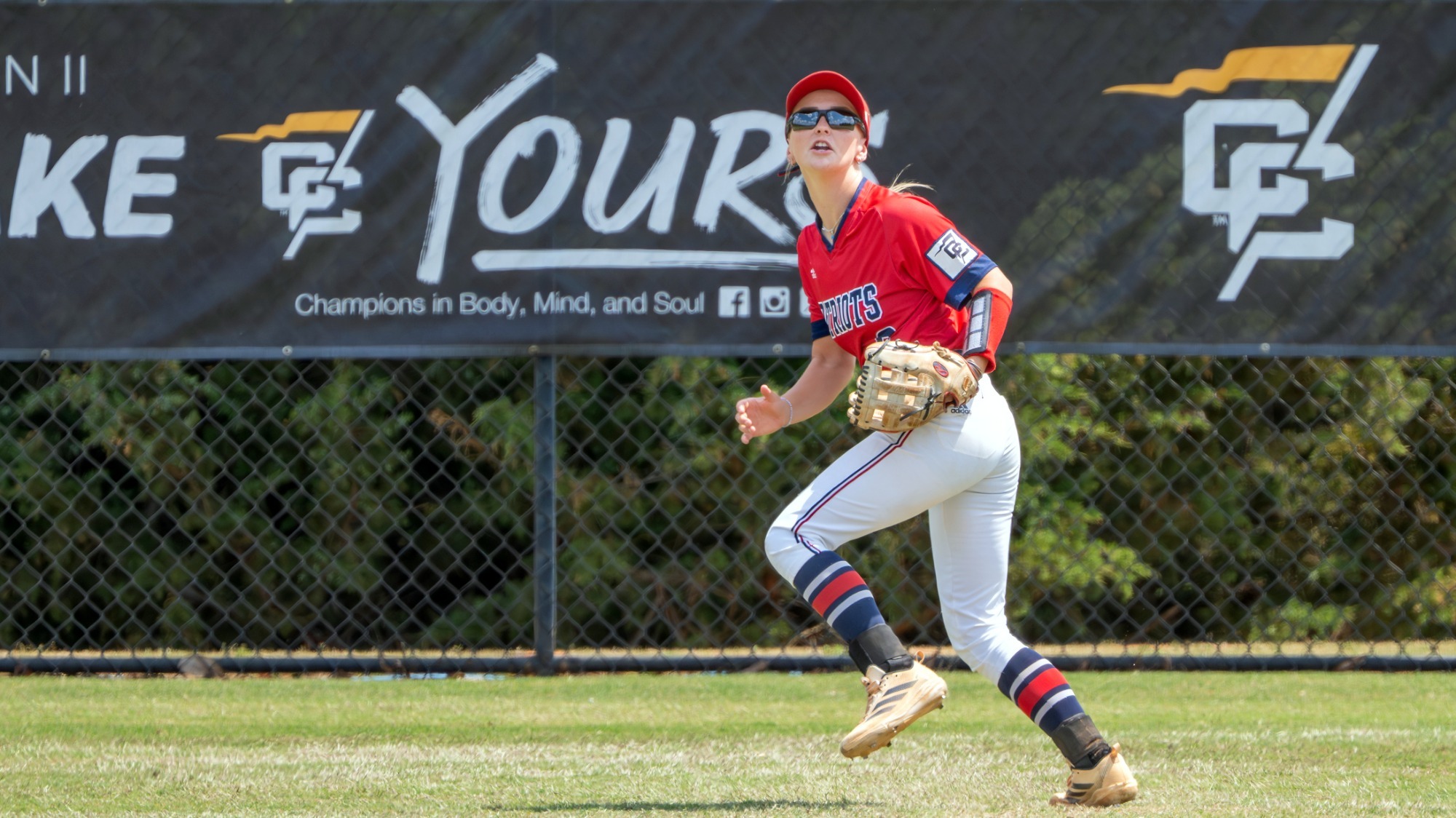 SB26 Mikaela Goss chasing a fly ball in the Conference Carolinas Tournament 