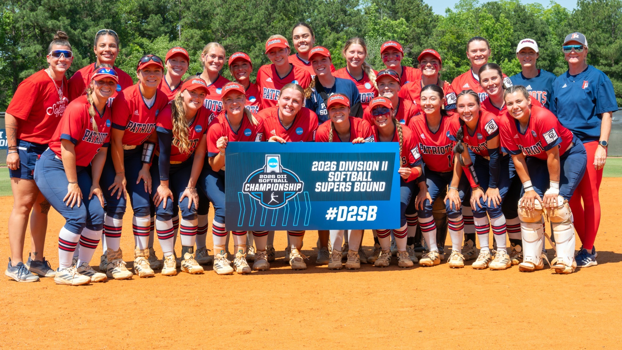SB26 Team photo with ticket to NCAA Super Regionals