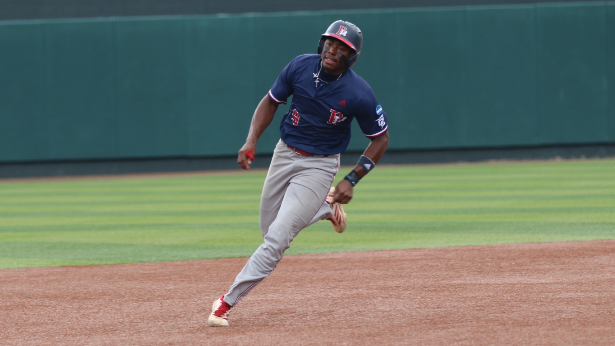 Charlie Bussey III running to 3rd vs. Catawba