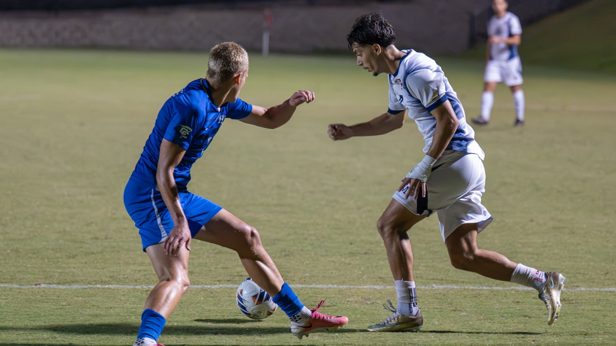 msoc26celikkol with the ball vs Barton 4673