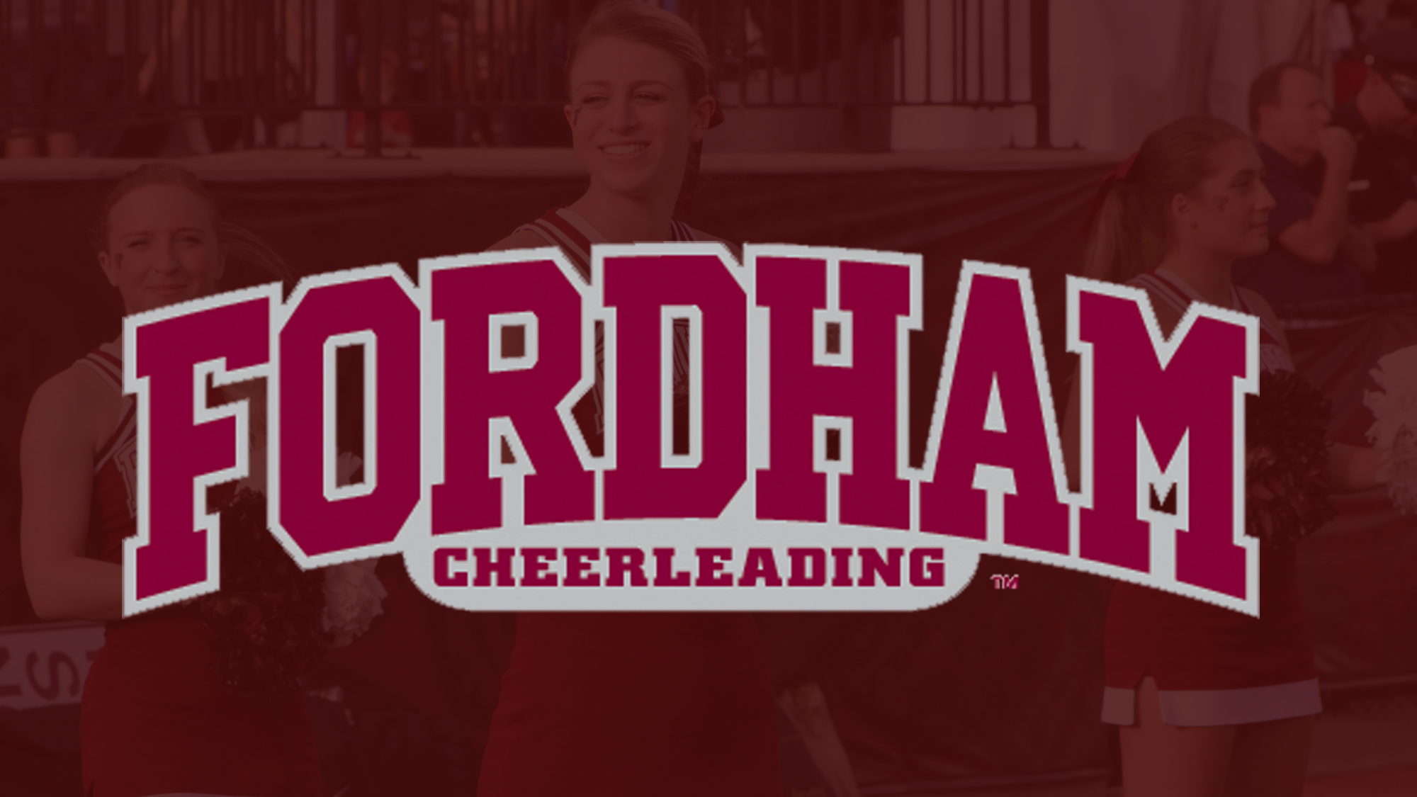 Fordham cheerleaders in action with Fordham cheerleading logo