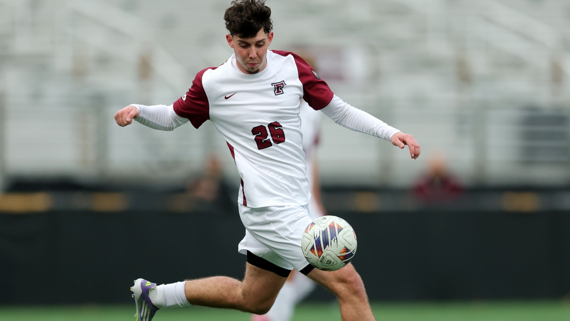 Daniel Lang dribbles against Dayton