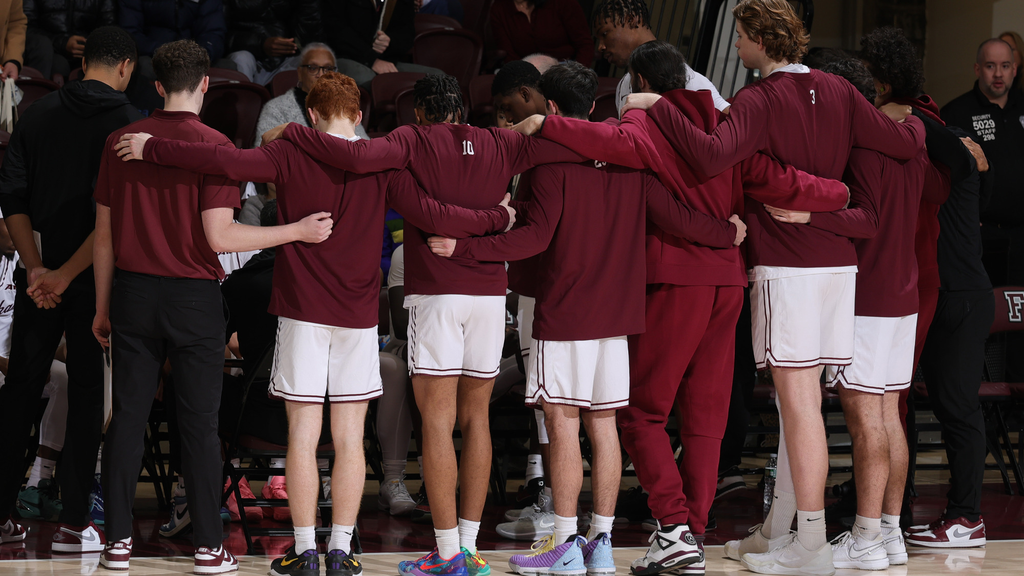 The Rams huddle prior to the New Haven game