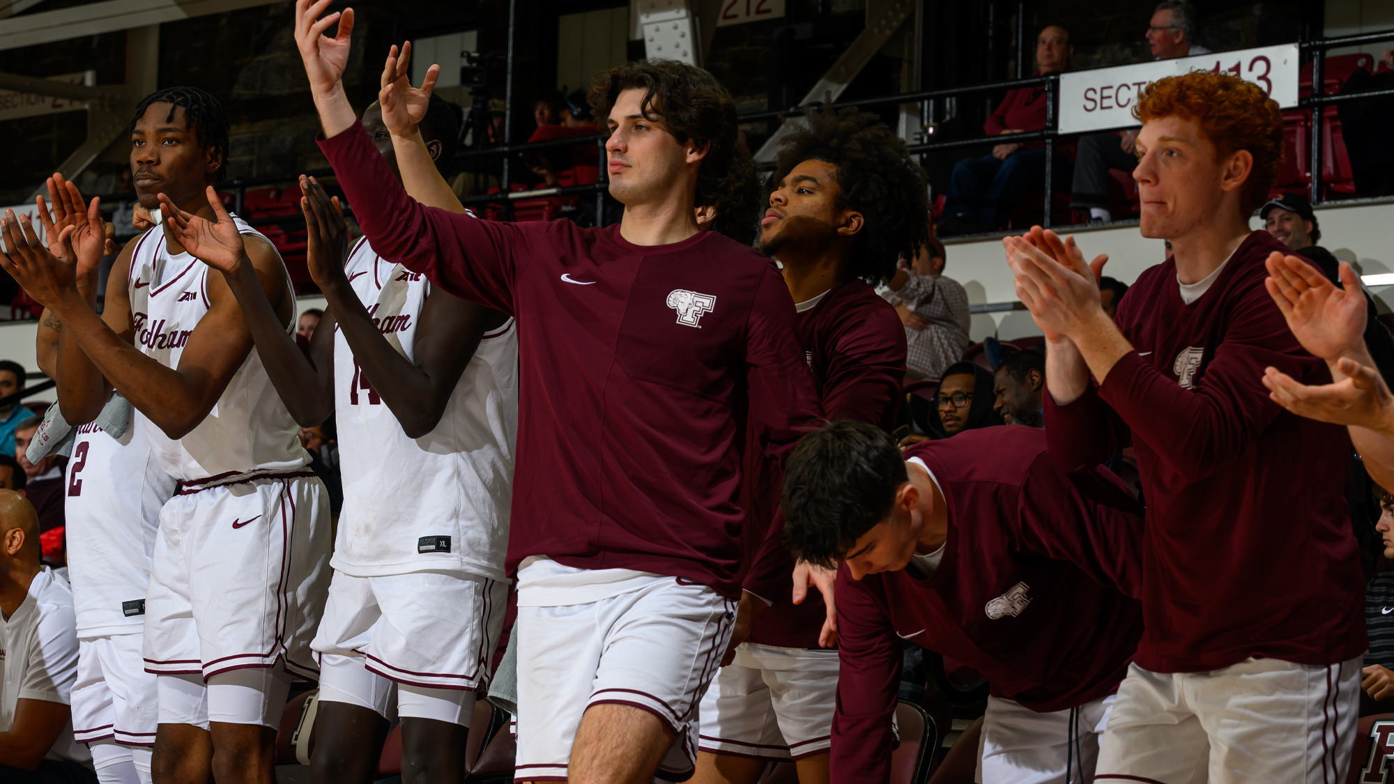 The Rams celebrate a basket