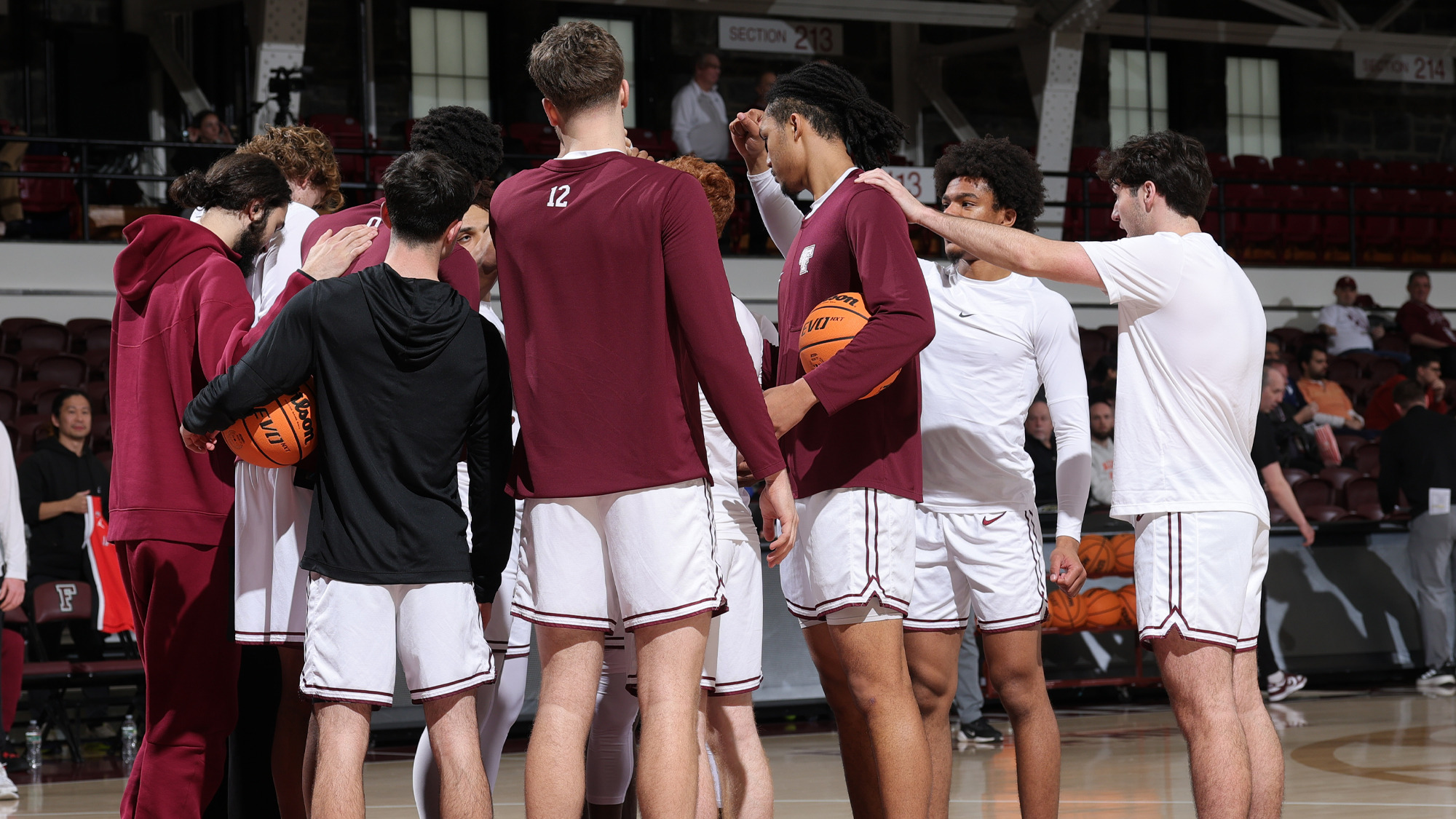 The Rams huddle prior to the Holy Cross game