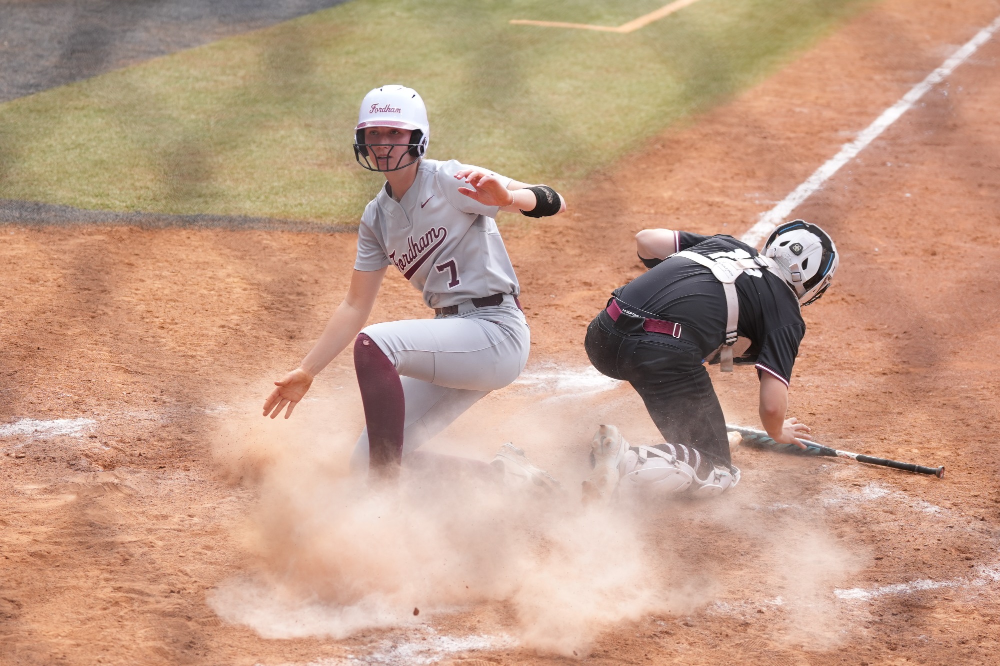 Erin Hoppe slides home to score