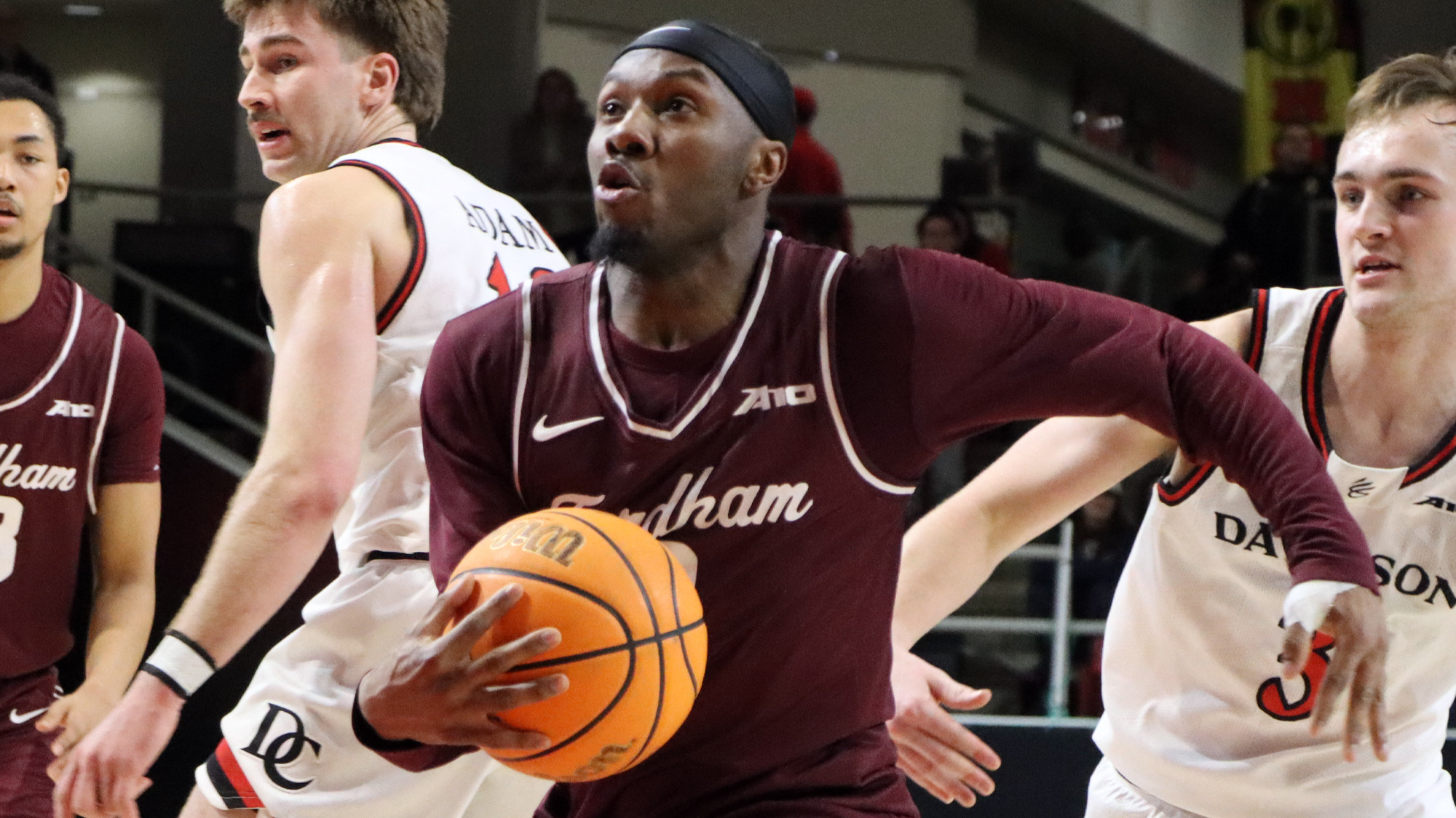 Dejour Reaves drives to the basket at Davidson