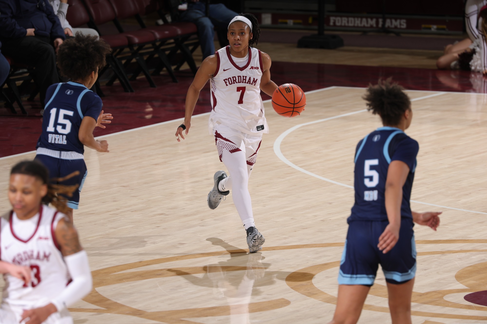 Morgan brings the ball up