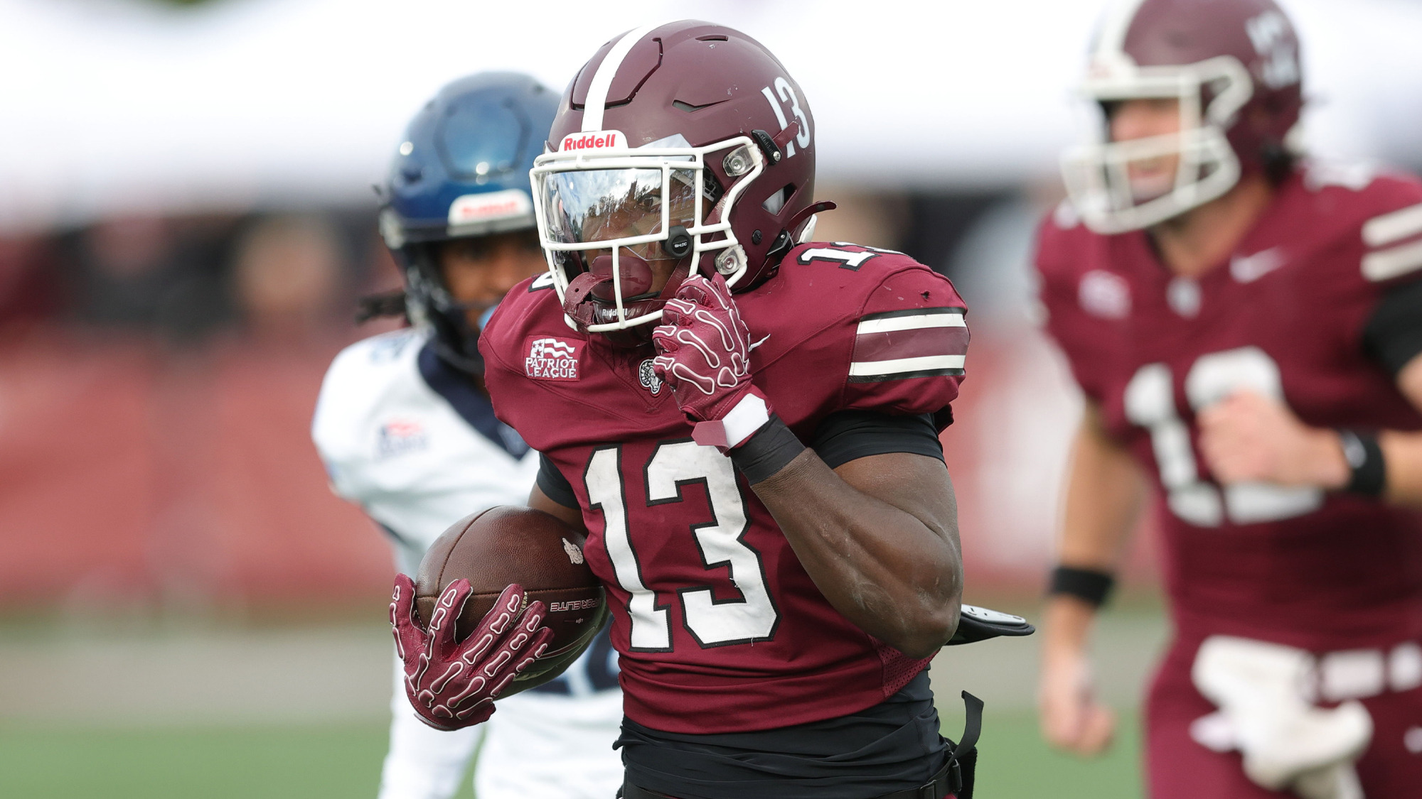 Yohan-Li Louis carries vs. Villanova