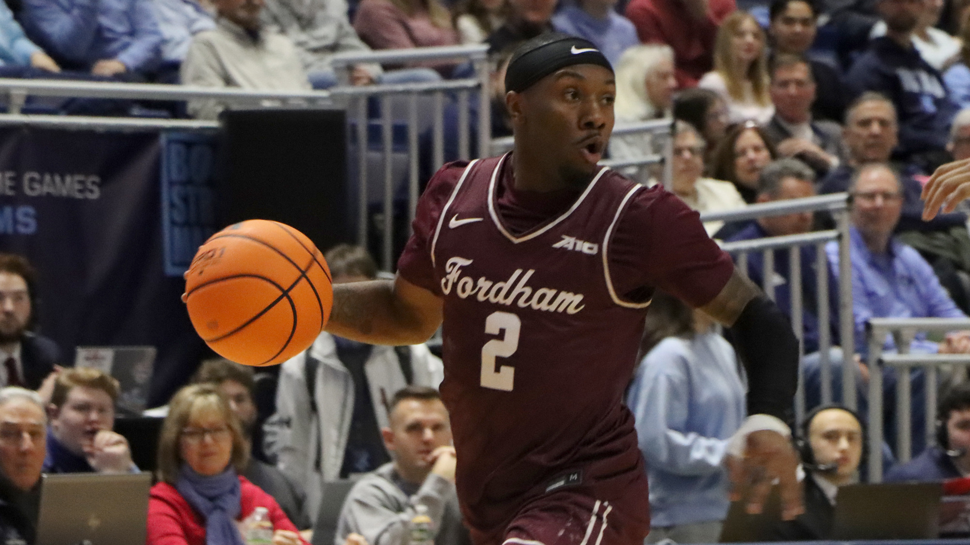 Dejour Reaves dribbles at Rhode Island