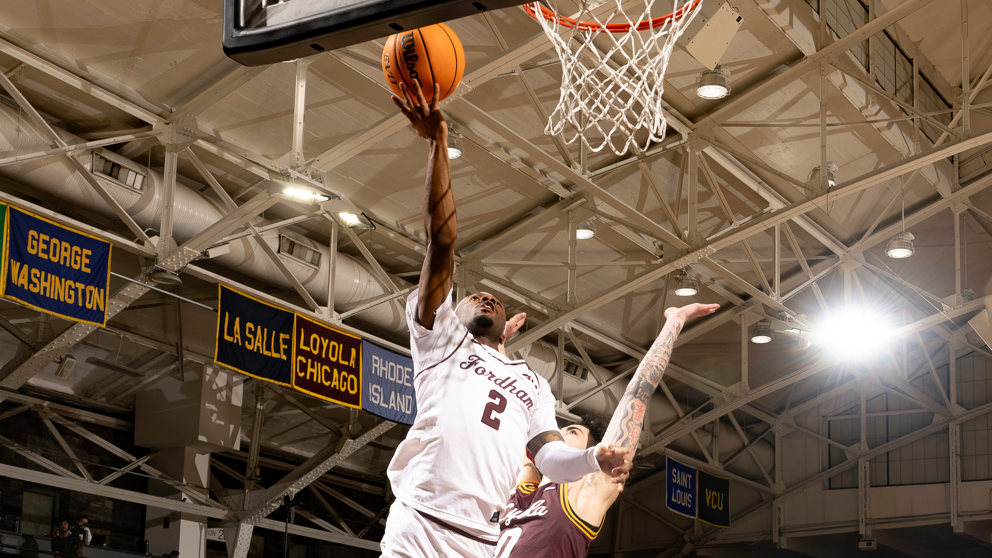 Dejour Reaves drives to the basket against Loyola Chicago