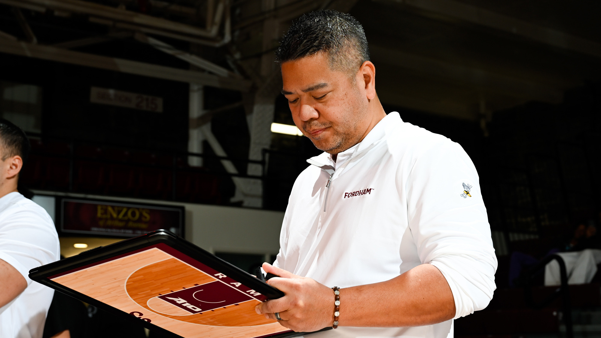 Head coach Mike Magpayo draws up a play