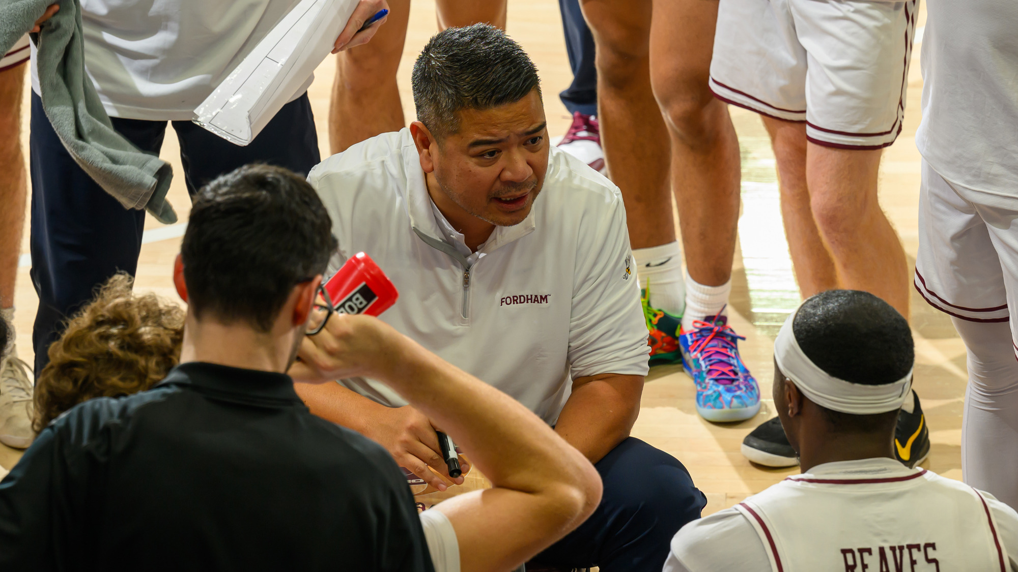 Head coach Mike Magpayo addresses the Rams