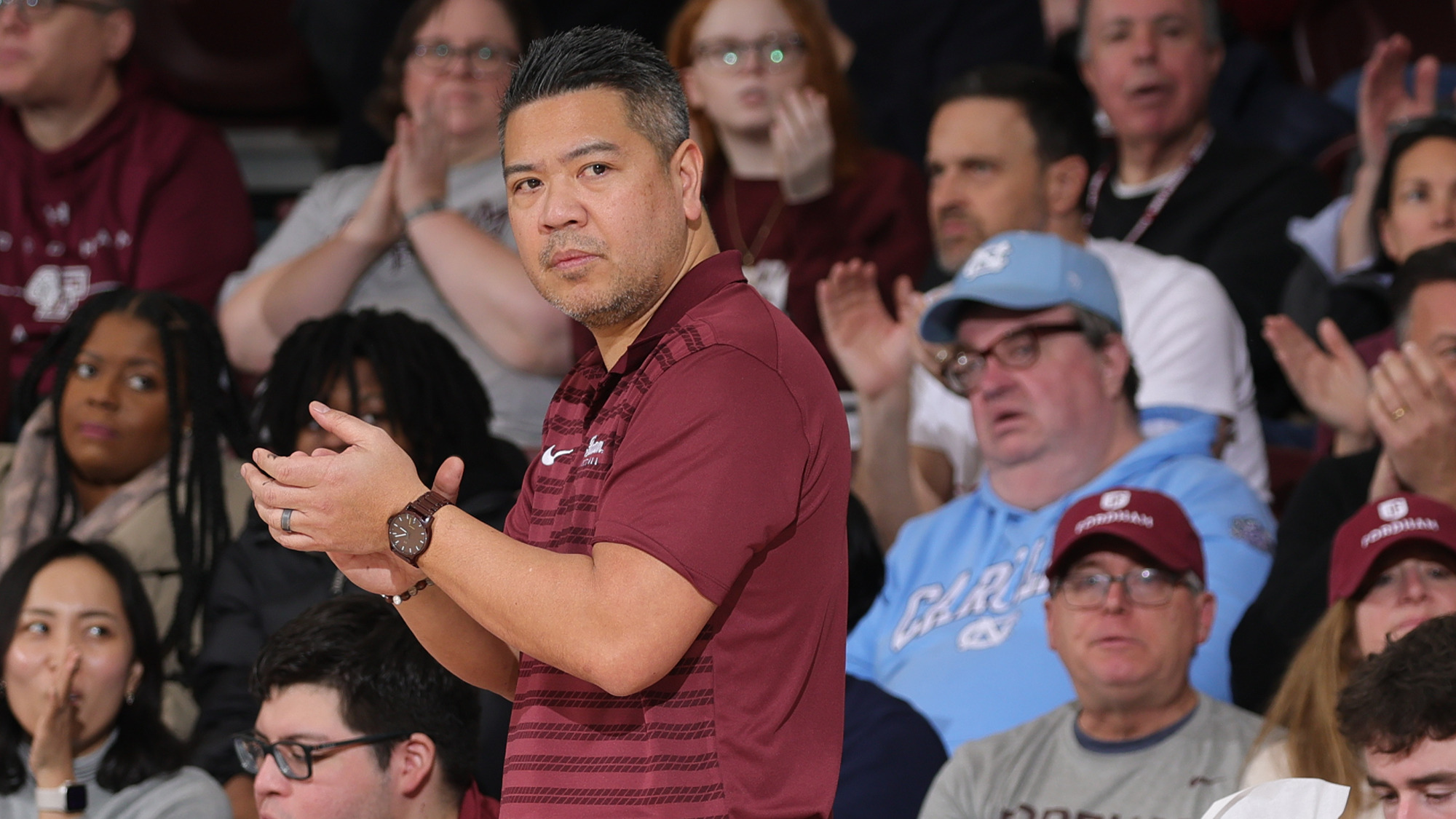 Mike Magpayo walks the sideline vs. URI