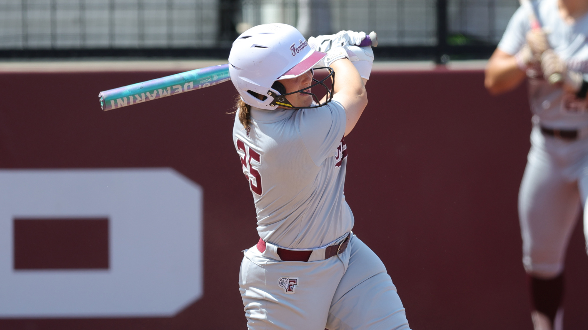 Kate McGuire follows through on a swing